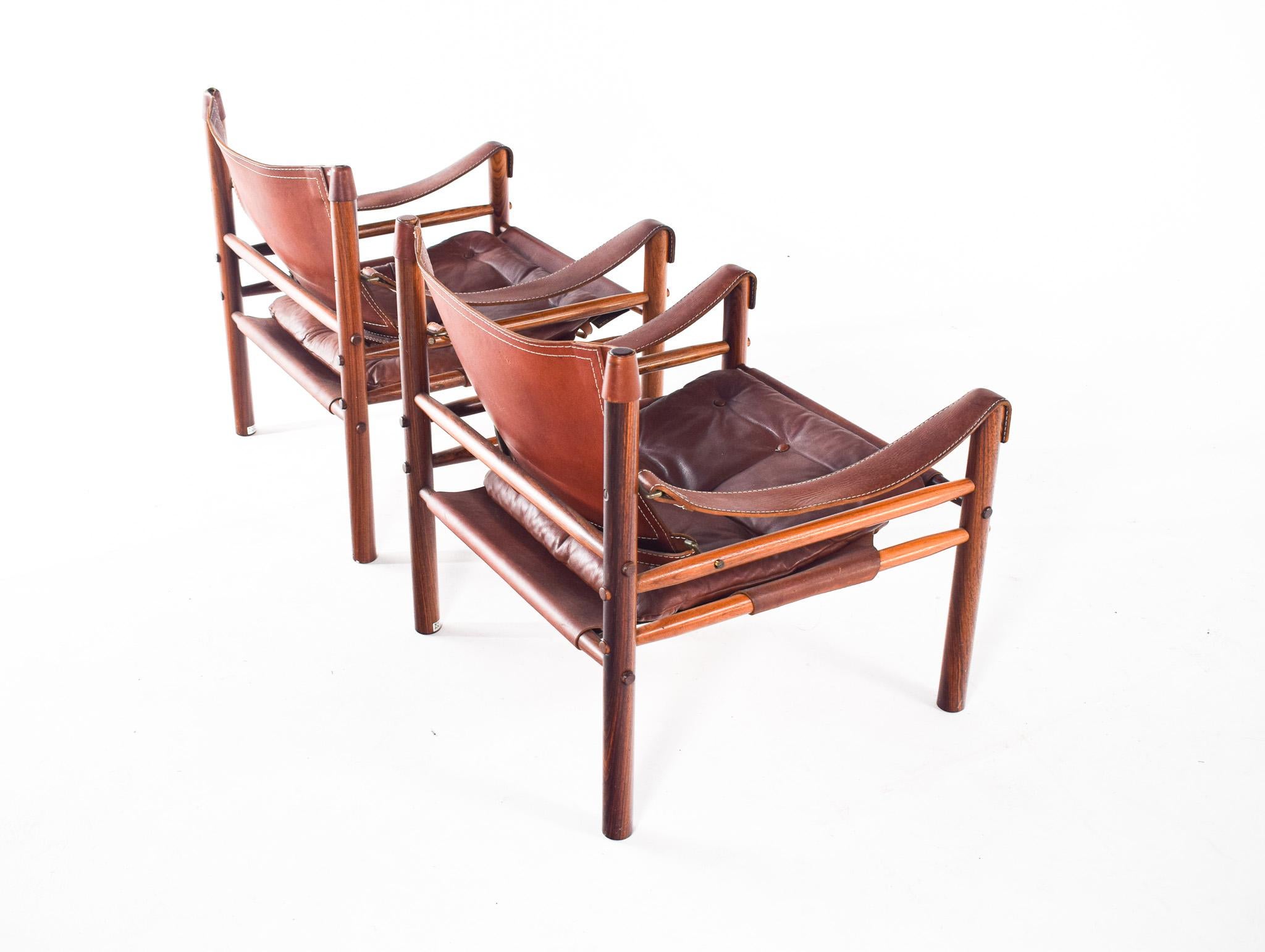 Mid-Century Modern Pair of Rosewood Armchairs by Arne Norell 4