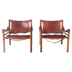 Mid-Century Modern Pair of Rosewood Armchairs by Arne Norell