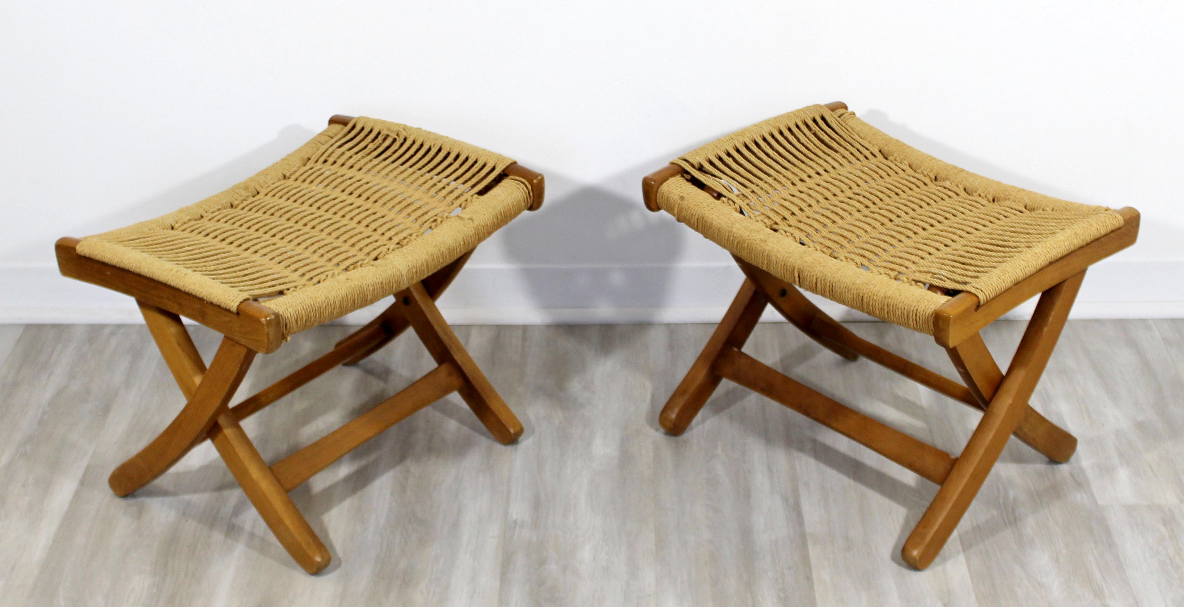 For your consideration is a wonderful pair of folding ottomans or bench seats, with rush cord, made in Yugoslavia, circa 1960s. In good vintage condition. The dimensions are 20