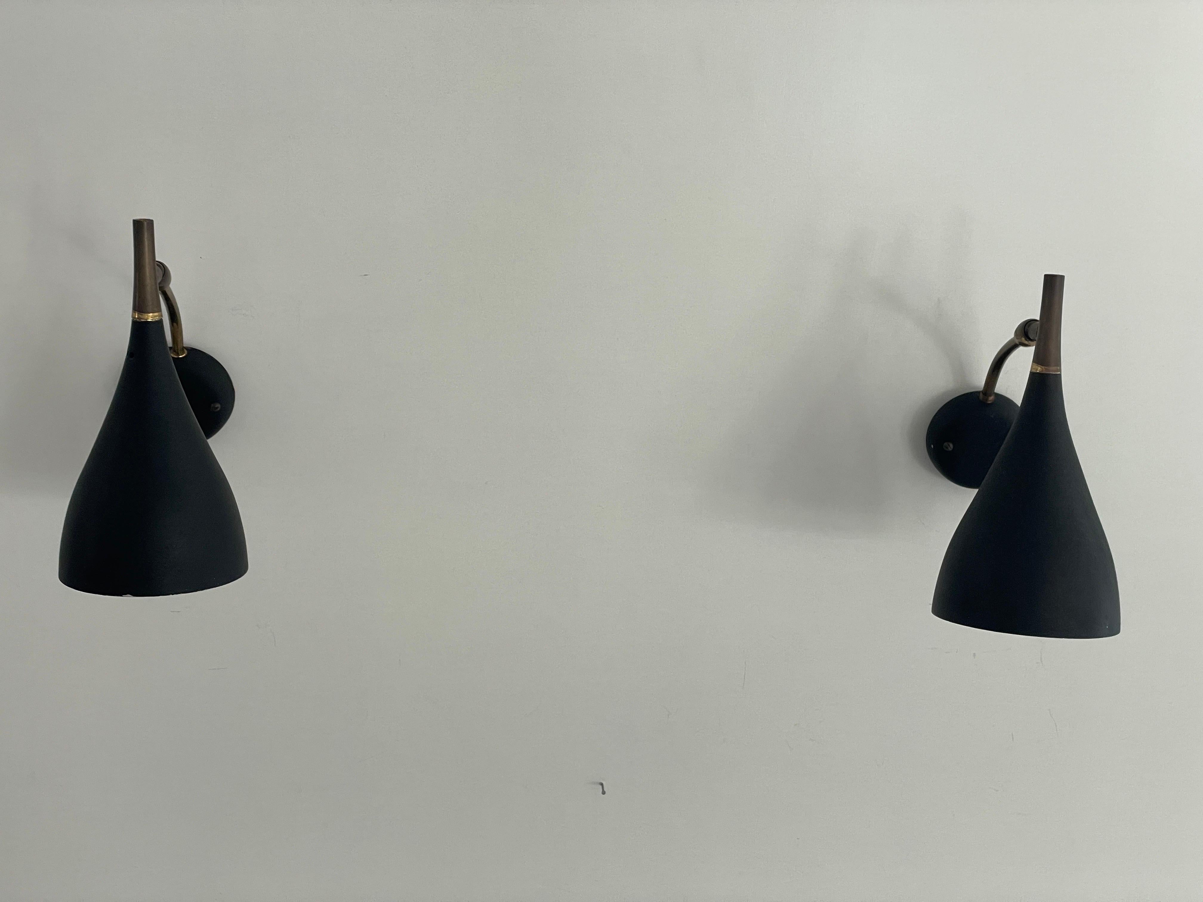Mid-century Modern Pair of Sconces by Cosack Leuchten, 1950s, Germany

Very elegant and Minimalist  Black wall lamps
Lamp is in very good condition.

These lamps works with E14 standard light bulbs. 
Wired and suitable to use in all countries.