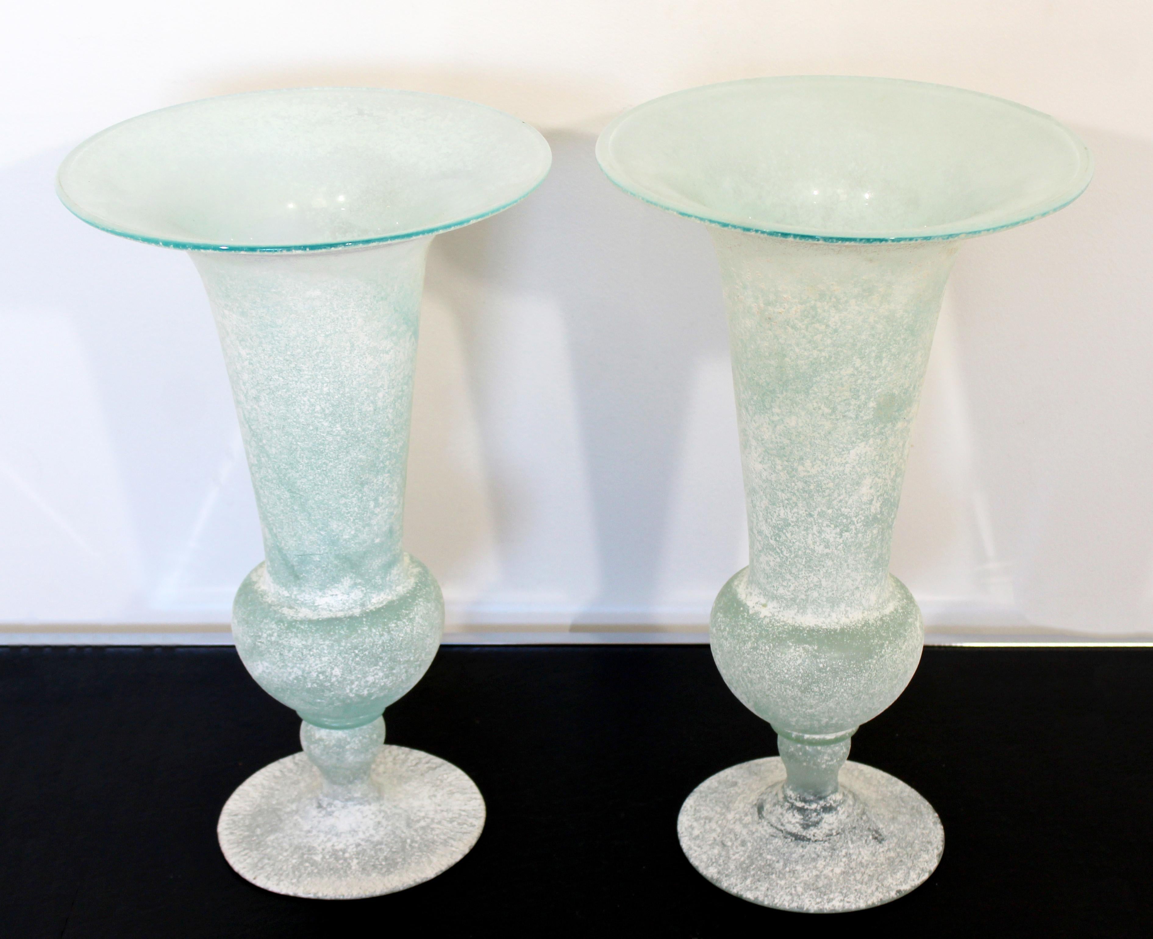 For your consideration is a breathtaking pair of glass vessels or vases, made in Italy, by Seguso Vetri d'Arte, circa 1980s. In excellent condition. The dimensions are 11.5