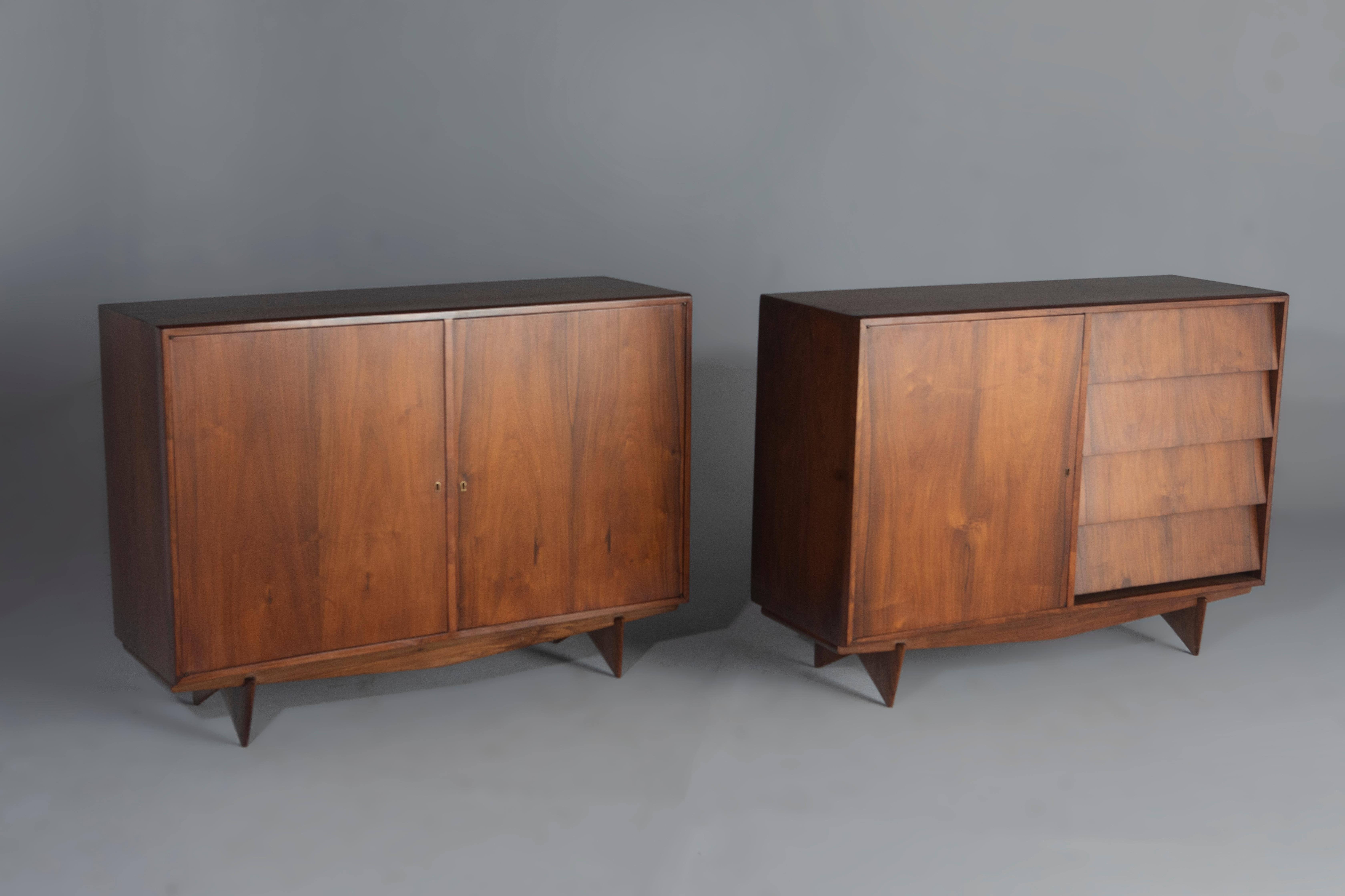 Mid-Century Modern Pair of Sideboards by Carlo Hauner, 1950s

Pair of sideboards manufactured by Carlo Hauner in the 50s.
Made of solid wood, the pair consists of one sideboard with 4 drawers and a storage door with shelf, while the other has two