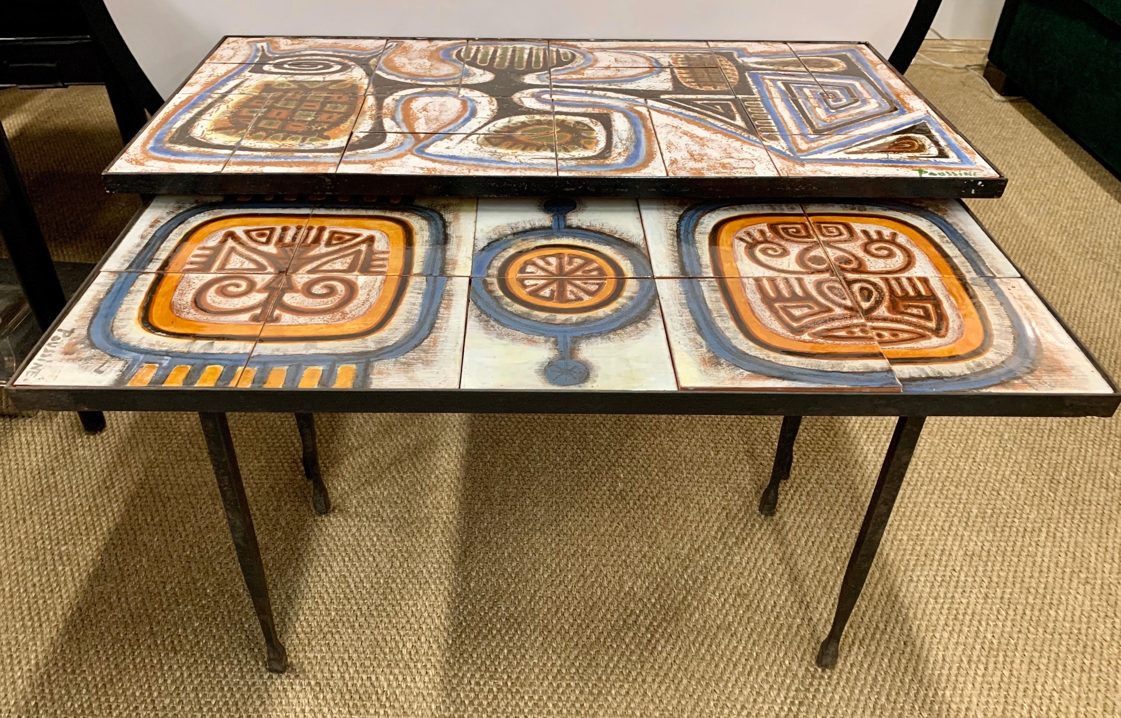 Rare pair of Italian tile top nested tables. Each table is signed by the artist on the tile. The signature reads 