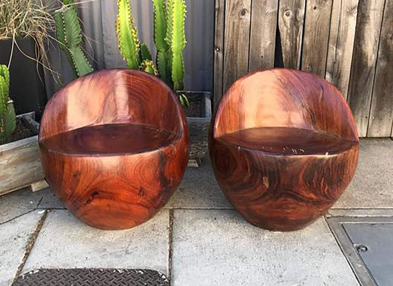 For your consideration, a pair of round chairs constructed of a solid block of macacuaba, unsure of the wood name, however.

Chairs are unmarked, with no information on the name of the maker or designer. 

 

Chairs are very heavy and will require