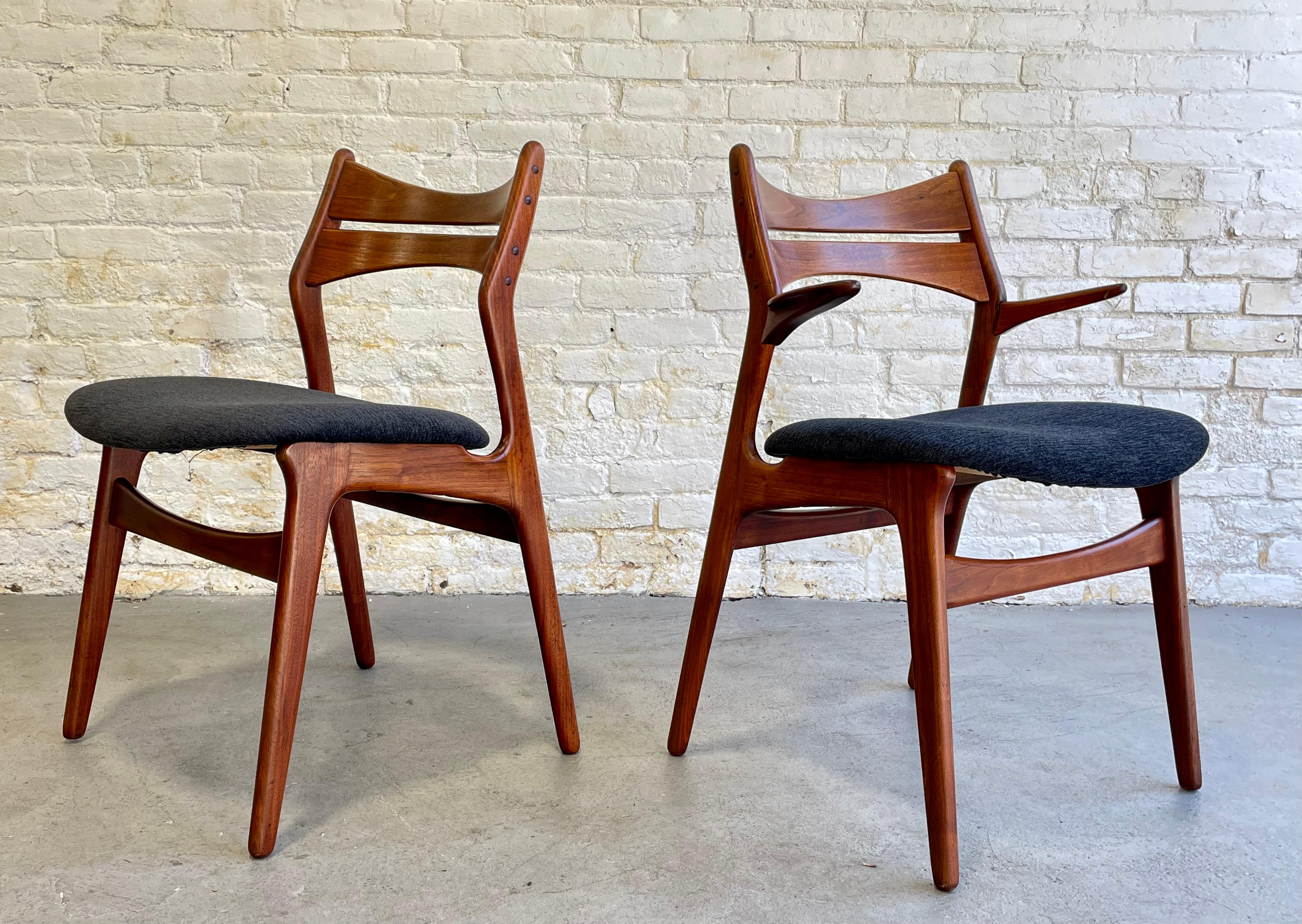 Incredible Pair of Mid Century Modern Teak Danish Chairs by Erik Buch for Christian Christiansen. Known as Model 310, this pair boasts sculpted backrests and generous seat design providing ultra comfortable support and seating. Solid wood legs
