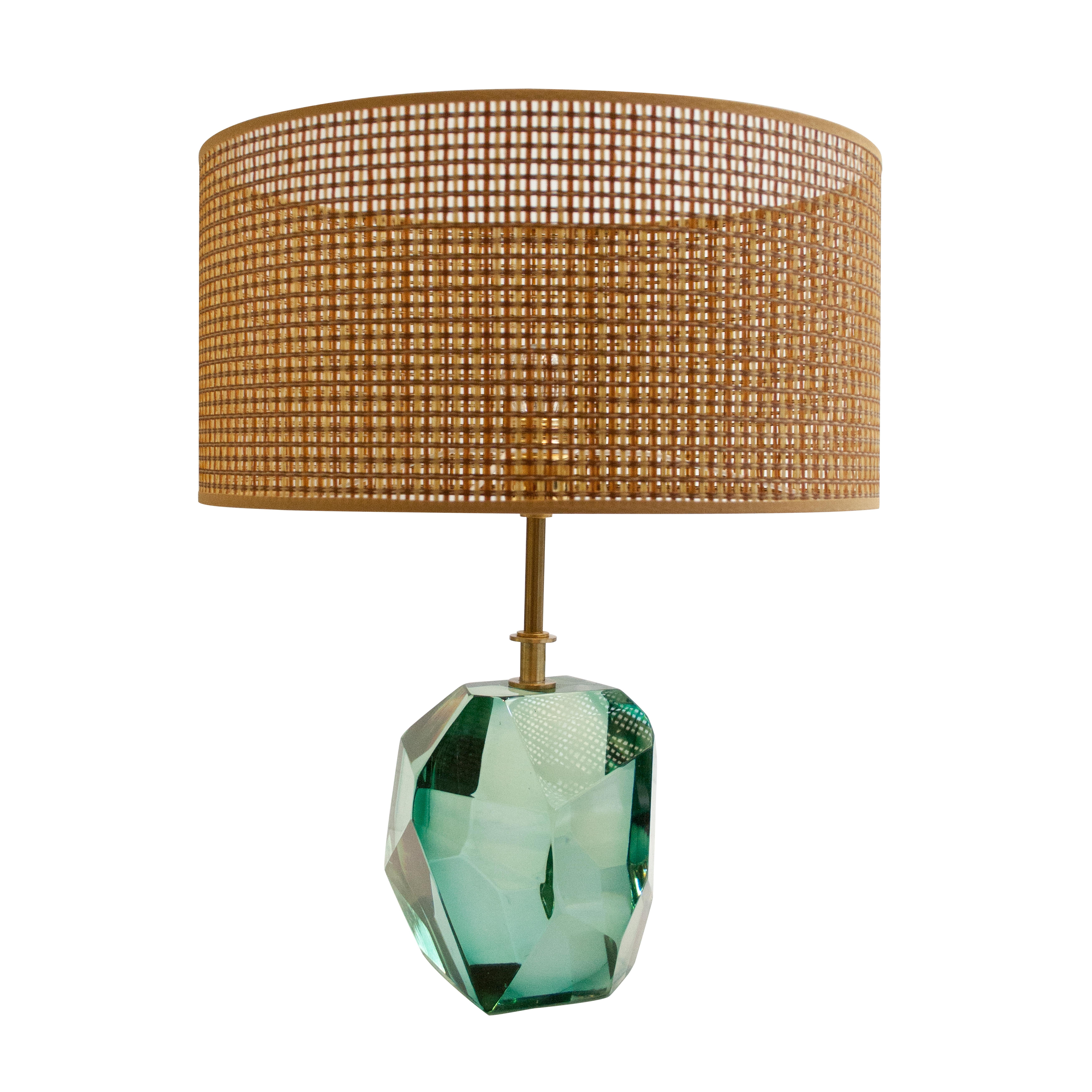 Pair of handmade table lamps made of Murano faceted glass in translucent turquoise with brass stem. Handmade lamp shade in natural fiber.