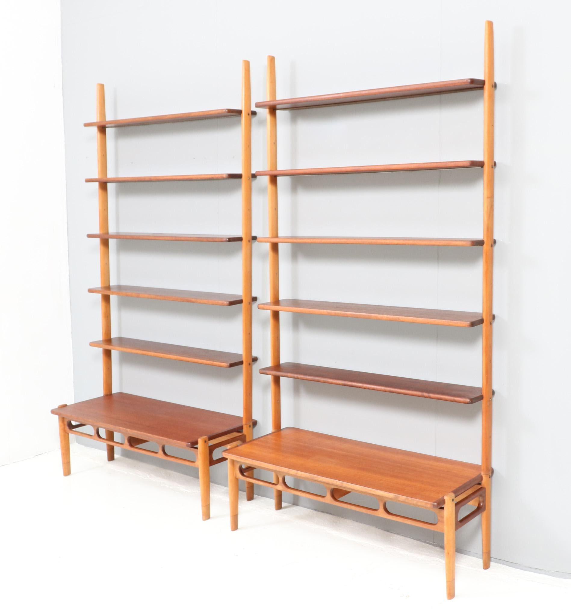 Pair of Mid-Century Modern modular two-tone wall units or shelving units. Design by William Watting for ScanFlex Holland. Striking Danish/Dutch design from the 1960s. Both wall units are made of solid patinated beech and original teak veneer and