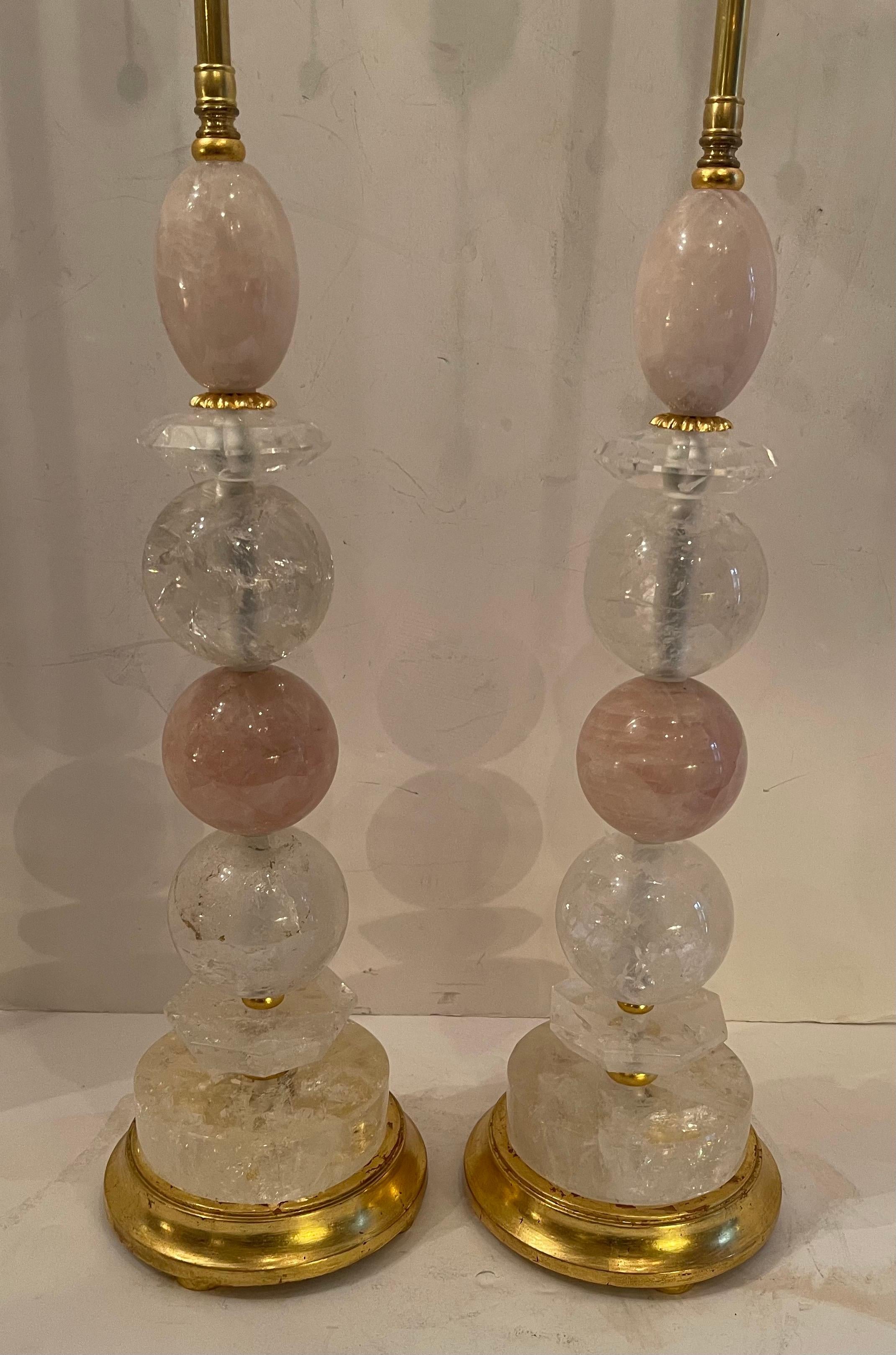 A Wonderful Pair Of Mid-Century Modern Large Various Forms Of Rock Crystal And Rose / Pink Quartz Crystal Stacked And Raised On Gold Leaf Wood Bases, These Are A Rare & Fine Pair Of Table Lamps In The Manner Of Maison Baguès.
Each With Two New