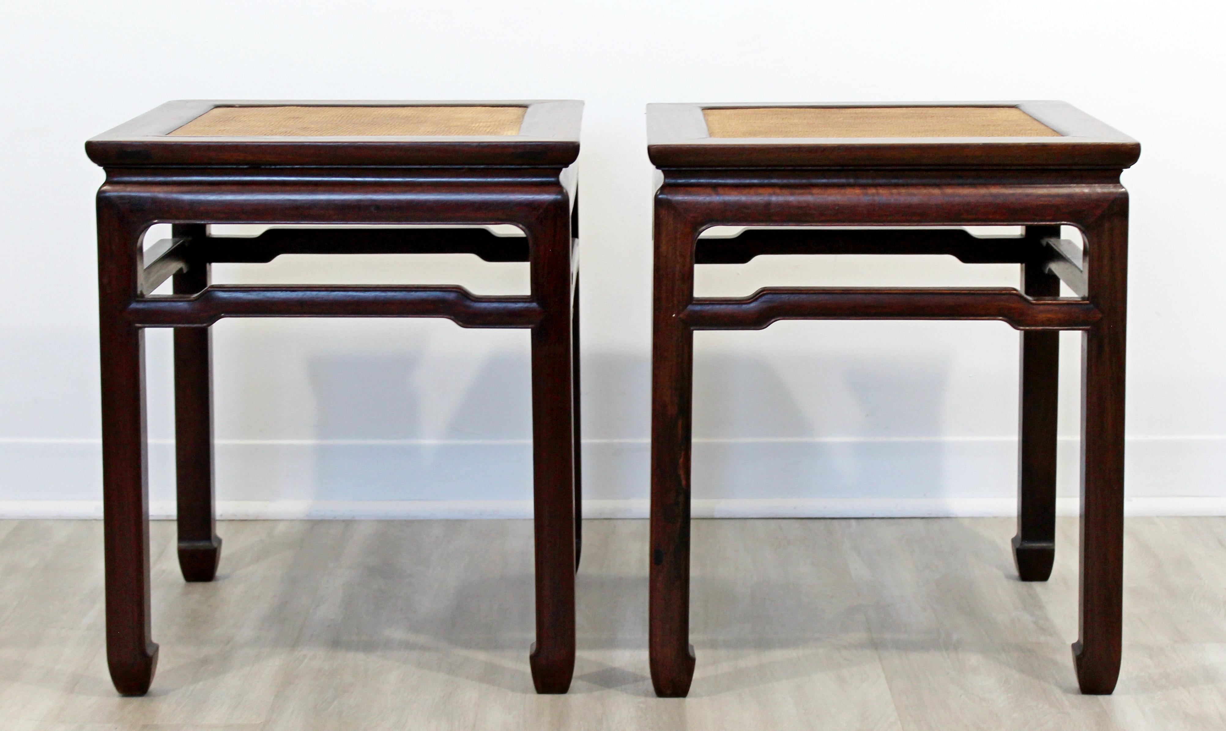 For your consideration is a stunning pair of Oriental style side or end tables, with cane tops. In good vintage condition. The dimensions are 17.25