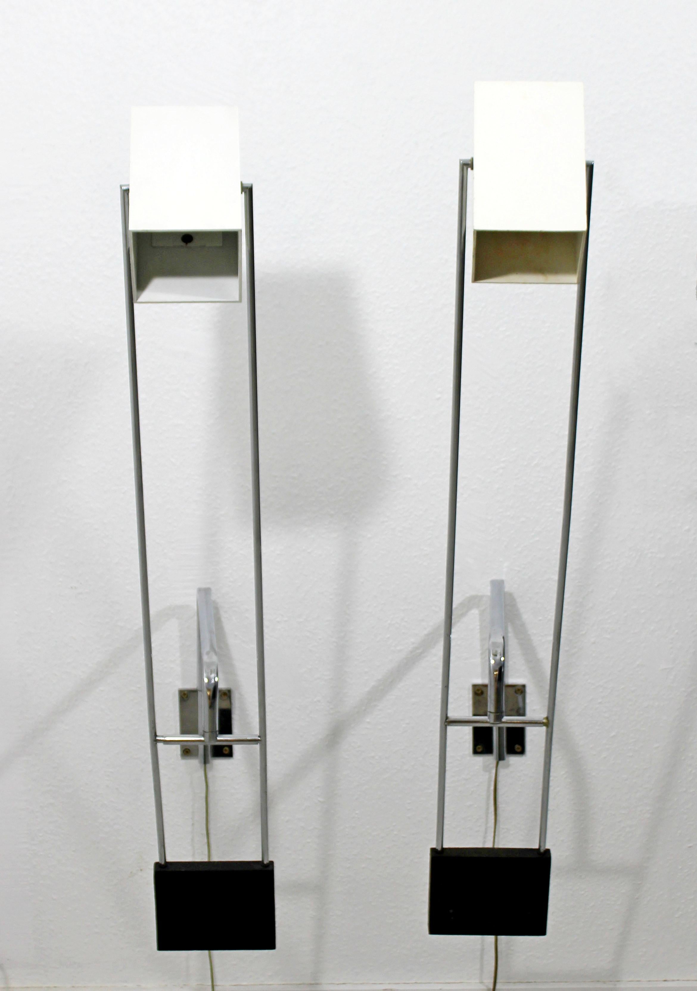 For your consideration is an incredibly unique pair of Sonneman adjustable, weighted, bedside reading lamps sconces. In very good condition. The dimensions of each are 6