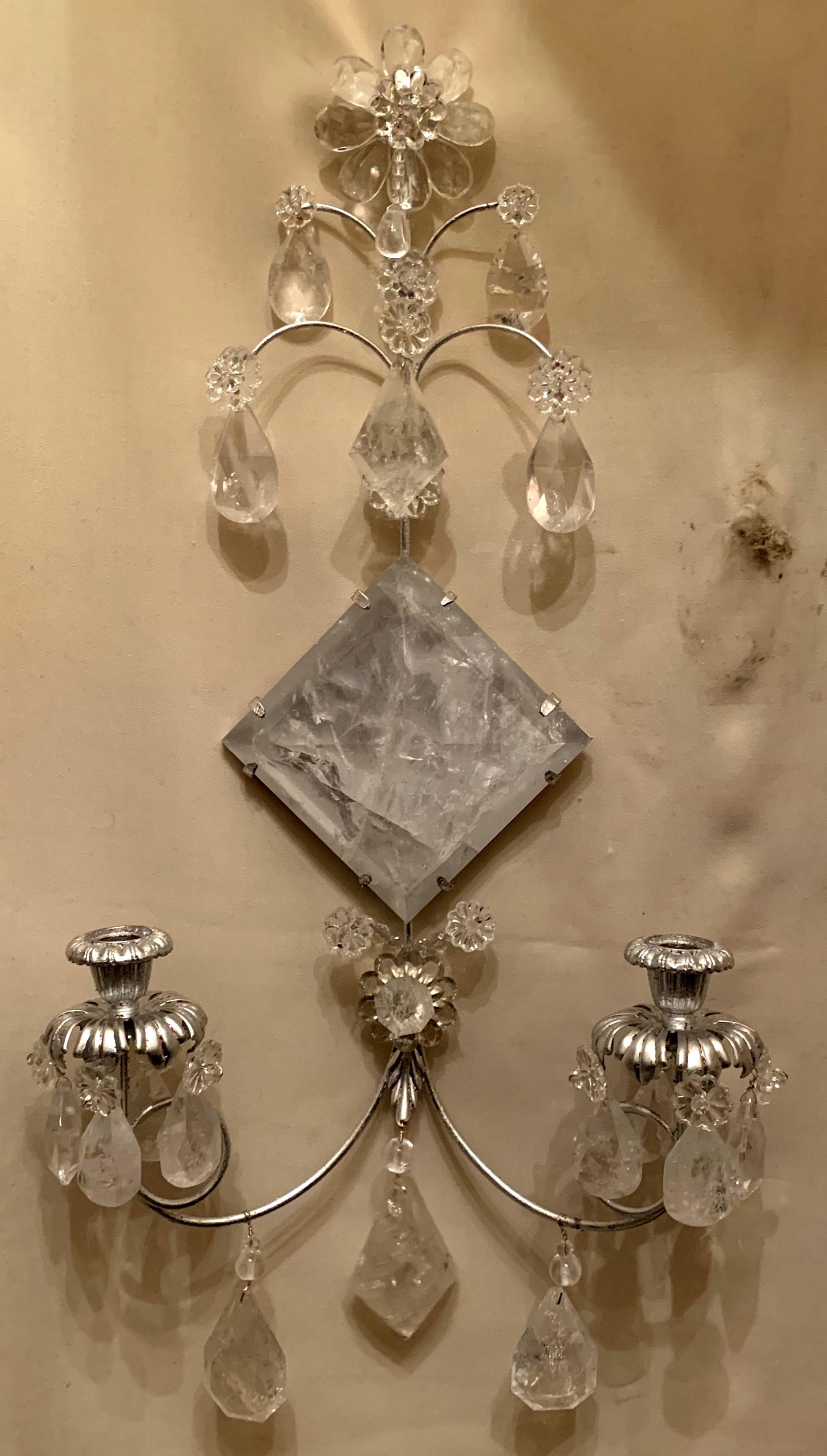 A wonderful Mid-Century Modern pair of transitional silver leaf and rock crystal sconces
Also available in gold leaf.

Wiring is available.