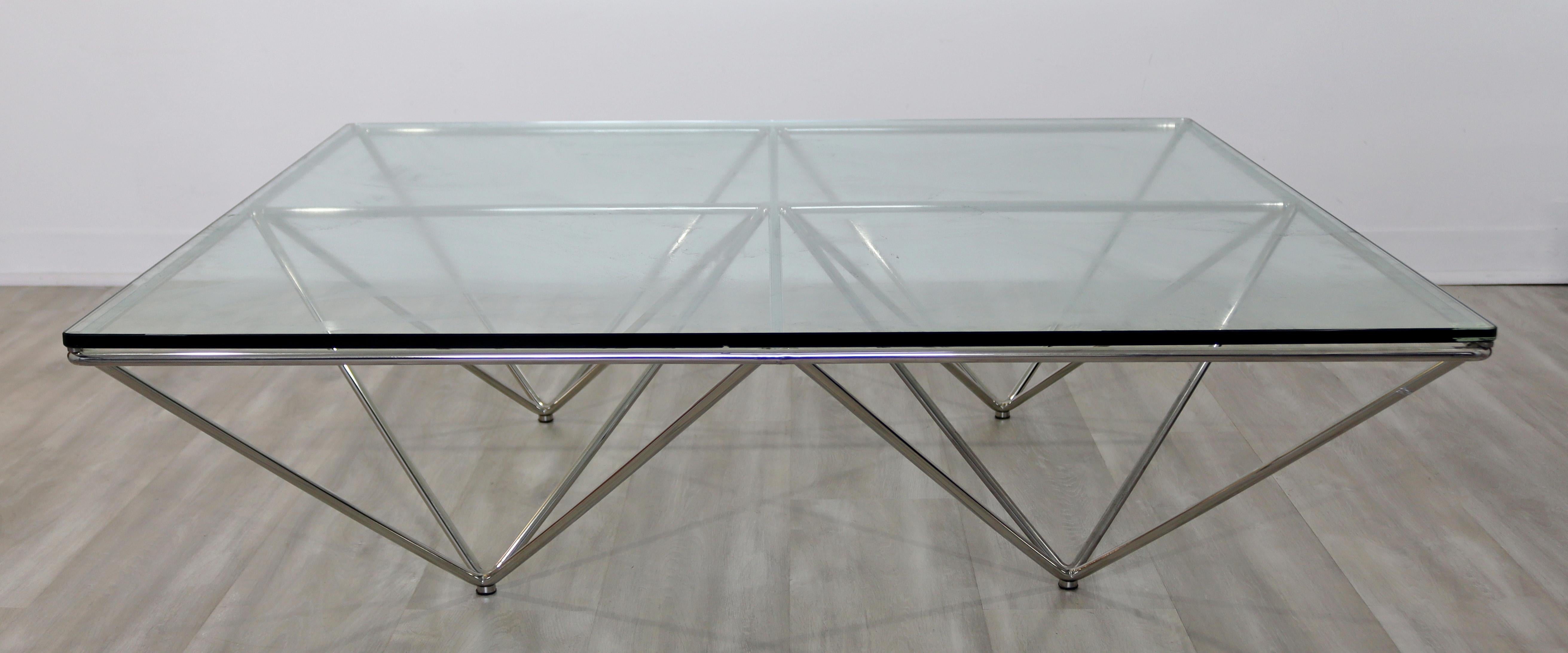 For your consideration is a phenomenal 'Alanda' coffee table, with a glass top on a geometric shaped chrome base, by Paola Piva for B&B Italia, circa the 1980s. In very good vintage condition, with a couple of chips in the glass. The dimensions are