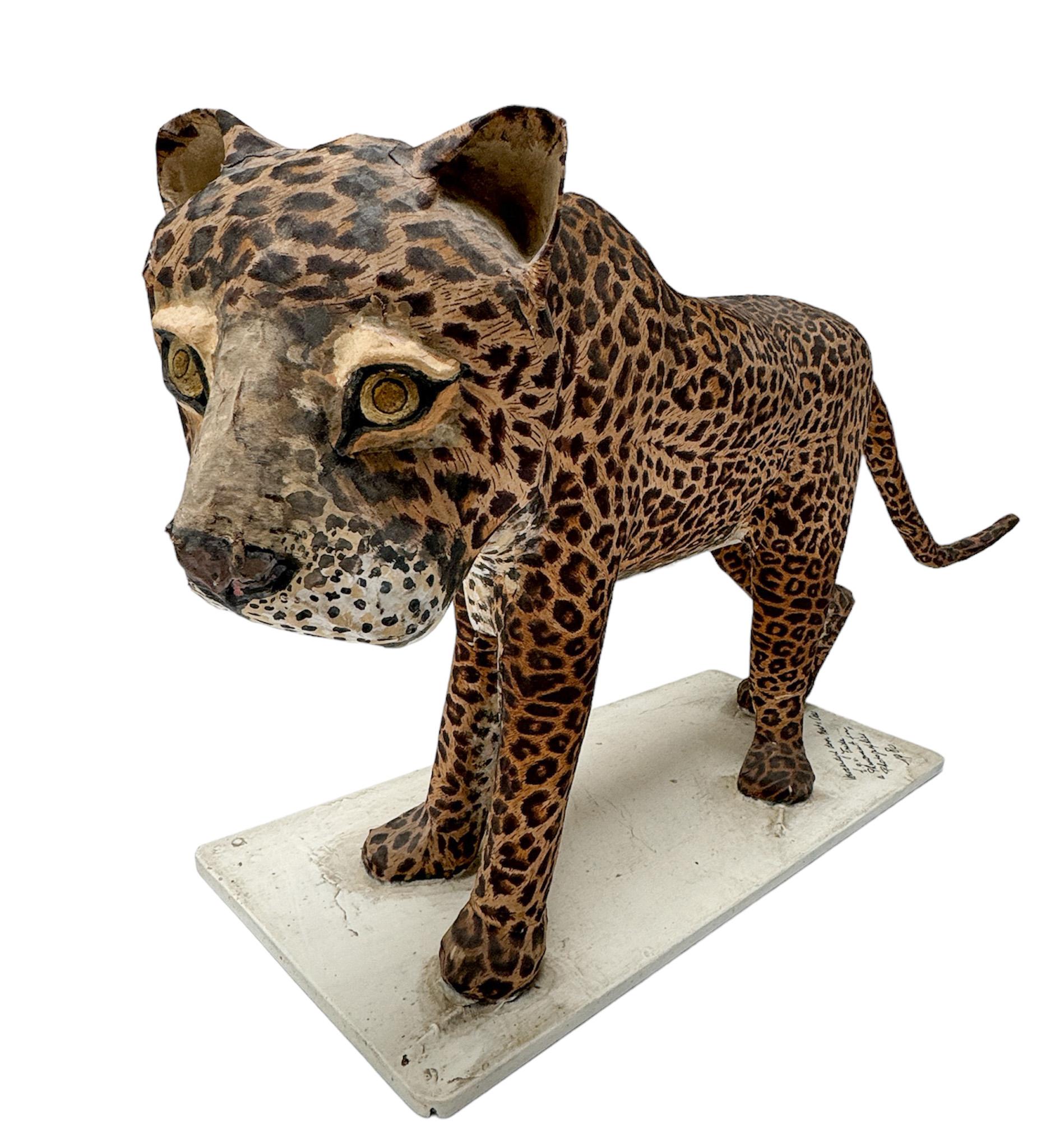 Stunning and rare one of a kind Mid-Century Modern sculpture of a leopard.
Design by Bert van Oers.
Striking Dutch design dated 1980.
Original hand-crafted and hand-painted paper machee sculpture on a painted wooden frame.
Marked with makers