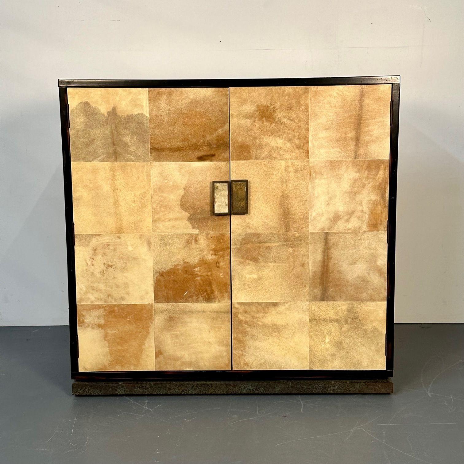 Mid-Century Modern Parchment Cabinet / High Chest, Jean-Michel Frank Style
 
A stylish two door cabinet or commode, nightstand having a fitted interior. The overall design of parchment paper and metal with wood framing. The doors having mother of