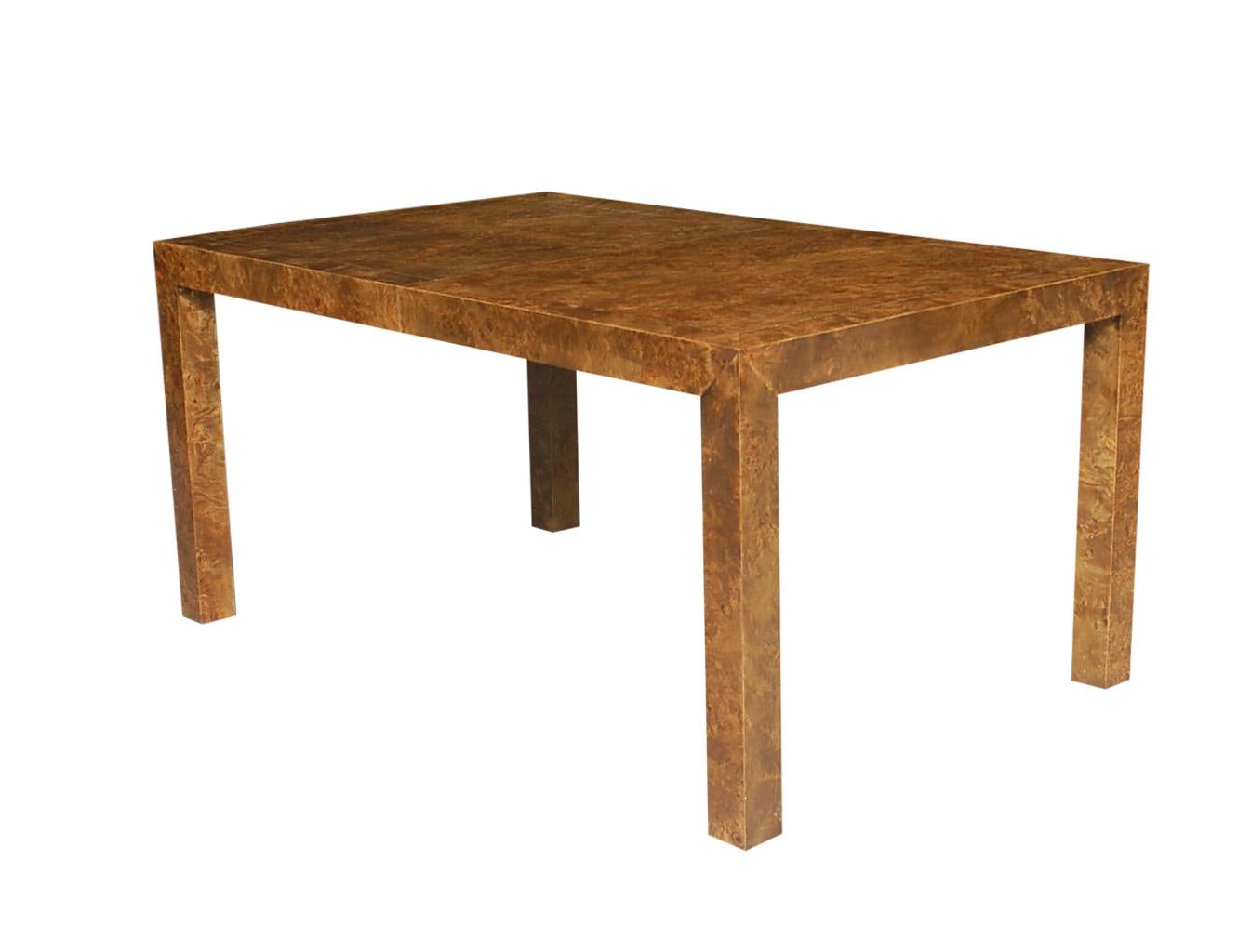 A classic, simple, and modern design for the 1960s. This table features beautiful burl wood veneer on top of solid wood construction. Table comes with two 18 inch extension leaves as shown.