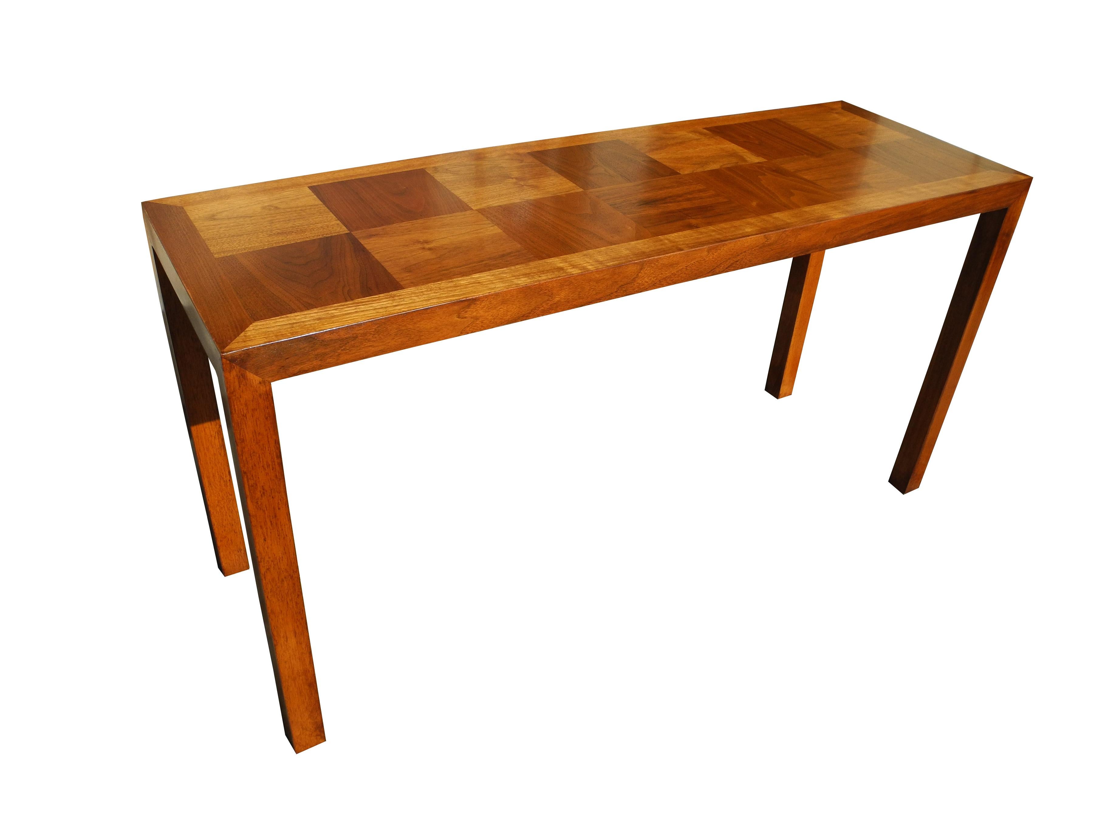 This parquet console is made of walnut and was designed in the Parson's style. Made in the 1950s by Lane Furniture.