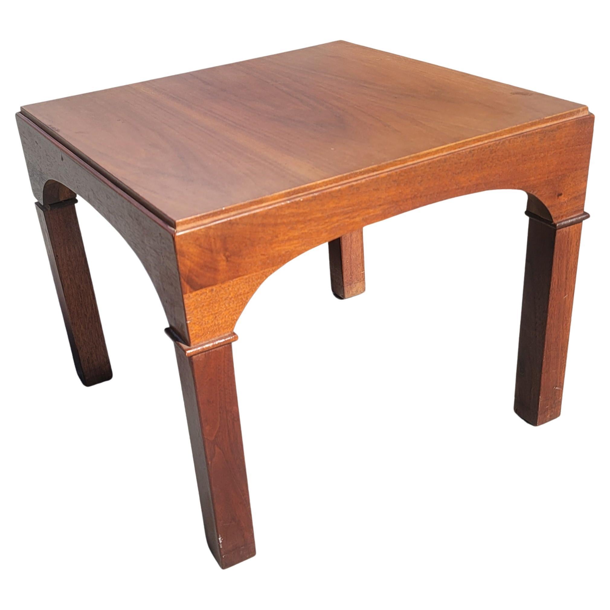 A Pair of Mid-Century Modern parson side table In walnut, measuring 18.25
