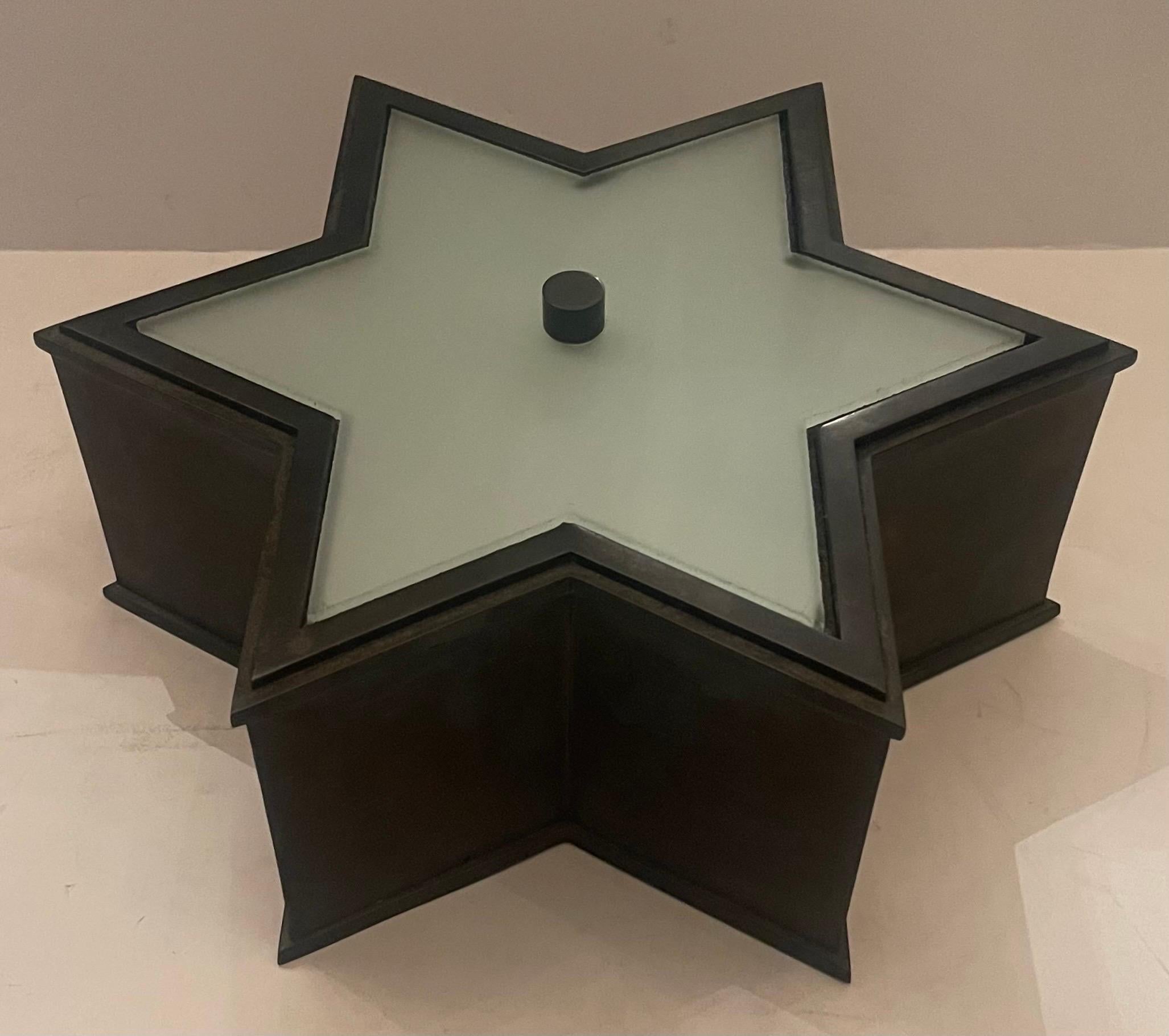 Wonderful Mid-Century Modern patinated bronze patina star form frosted glass flush mount light fixture with 2 candelabra lights, ready to install with mounting hardware and UL sticker. 