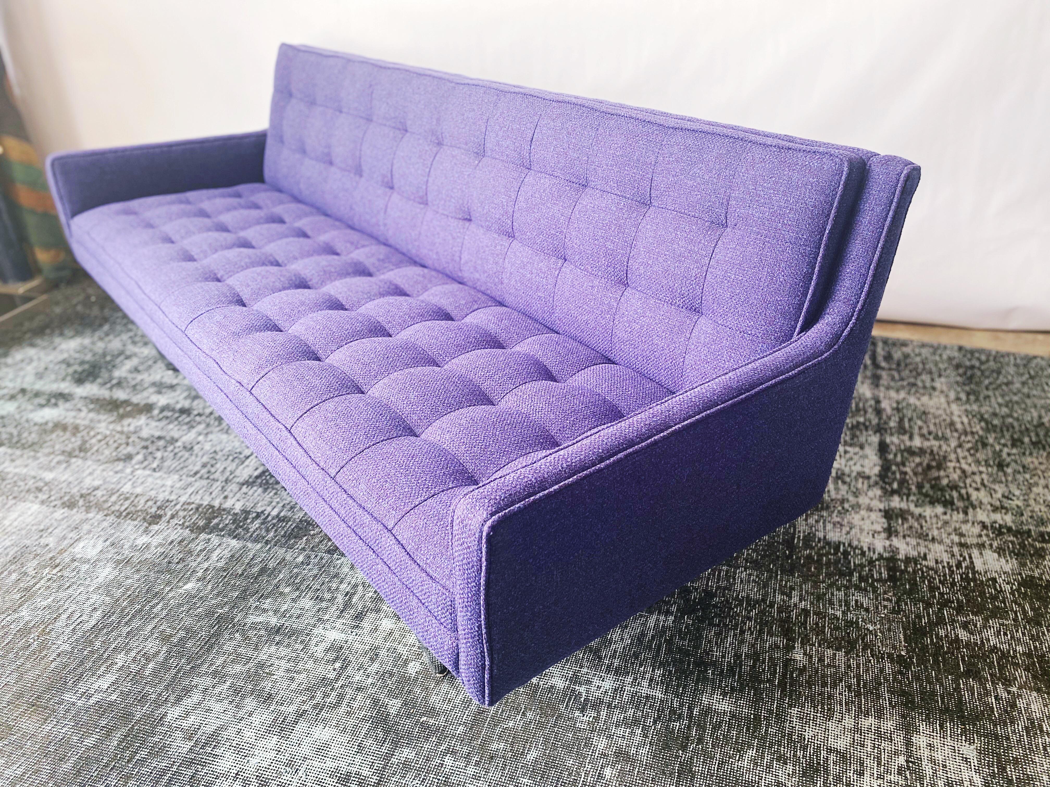 Stunning Mid-Century Modern tufted Patrician sofa is in overall excellent condition. New foam, new strapping and new upholstery. Bold Minimalist design. Purple and blue wool tweed tufted upholstery and a sturdy chrome sled base.
1970s,