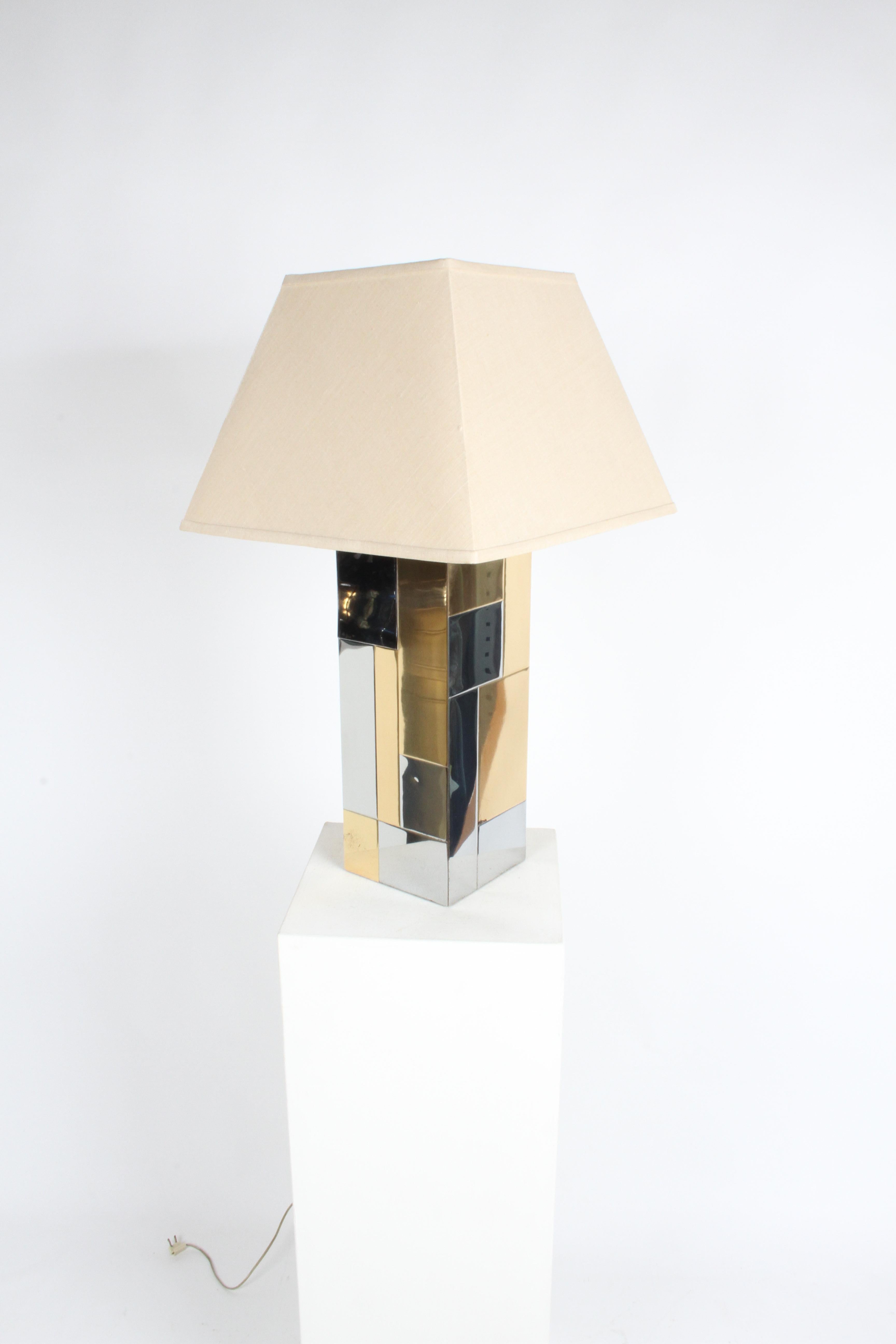 Paul Evans Cityscape brass and chrome table lamp for directional, circa 1970s. Has patina to brass and chrome, two small dings. Works. excludes shade.