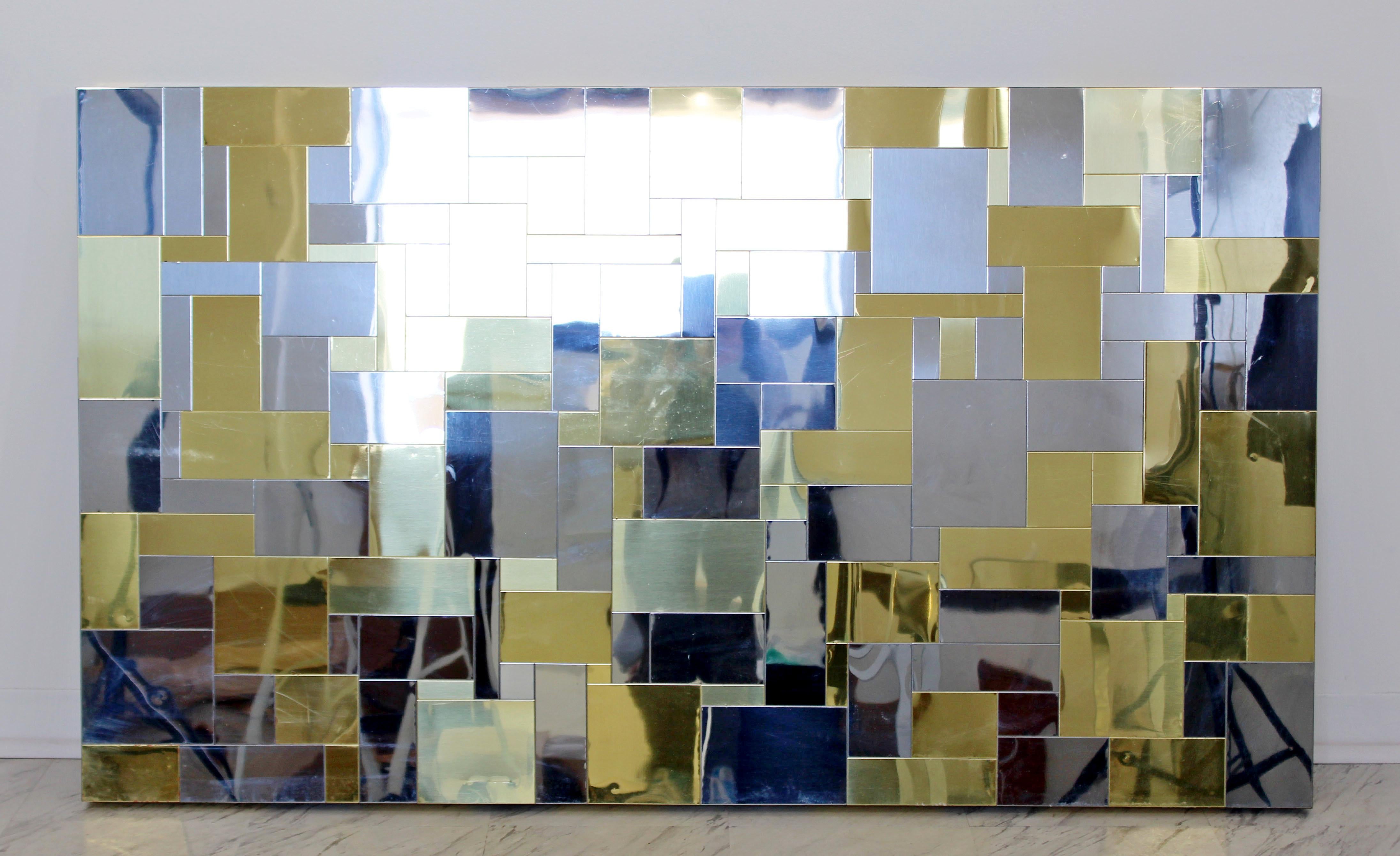 For your consideration is a phenomenal headboard, made of patchwork brass and chrome, signed by Paul Evans for Directional, the Cityscape collection, circa the 1970s. In good vintage condition. The dimensions are 62