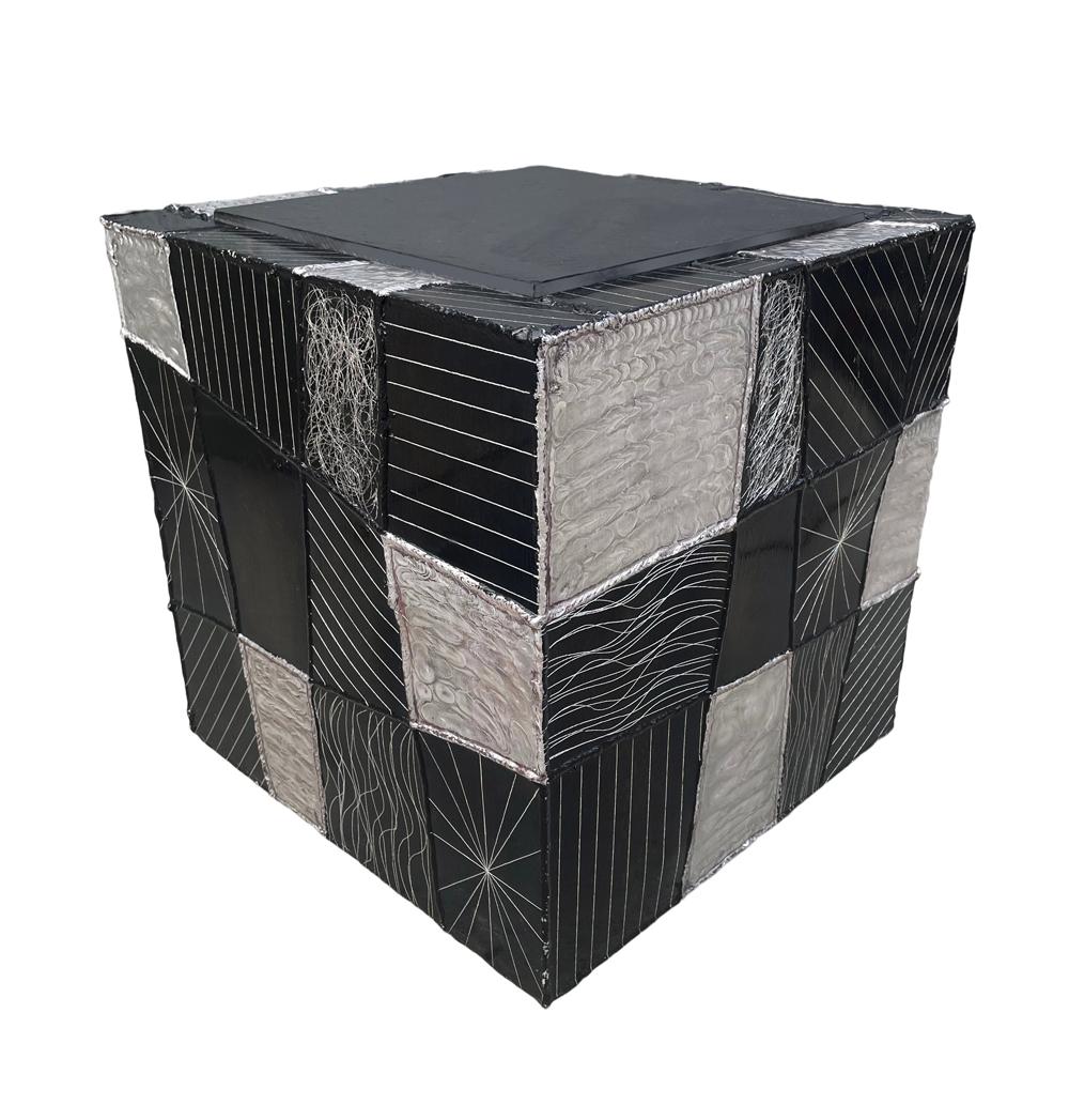 A studio made argente cube made by Paul Evans in the 1970's. It features welded aluminum construction with slate top insert.