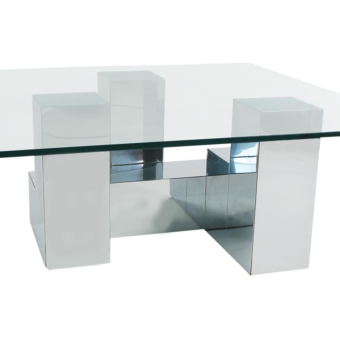 A stunning Cityscape design coffee table in the manner of Paul Evans. It features a chrome-plated wood constructed base, topped with thick clear glass top.