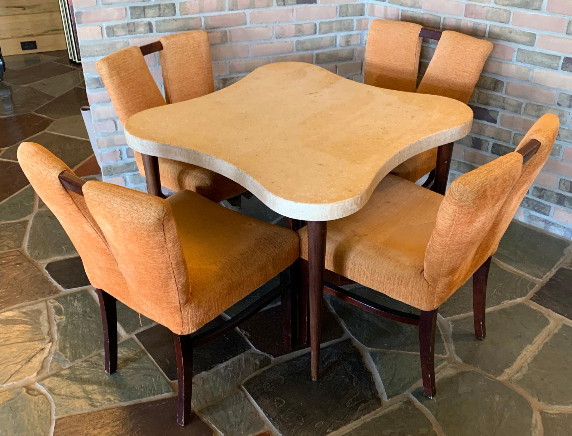 For your consideration is a unique, cork topped, quatrefoil game table, with a set of four V shaped chairs, by Paul Frankl for Johnson, circa the 1970s. In vintage condition. The table can be used as is, but would look amazing touched up.The