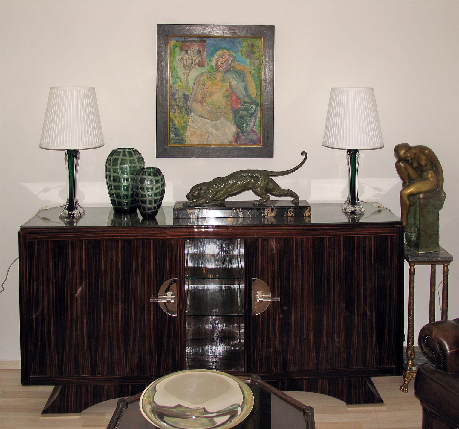 Exceptional Swedish Mid-Century Modern Sommerso pair of table lamps. Designed by Paul Kedelv who was in the early 1950s the chief designer at Swedish Flygsfors'. Deep forest green crystal encased in clear crystal with squared base. Marked to the