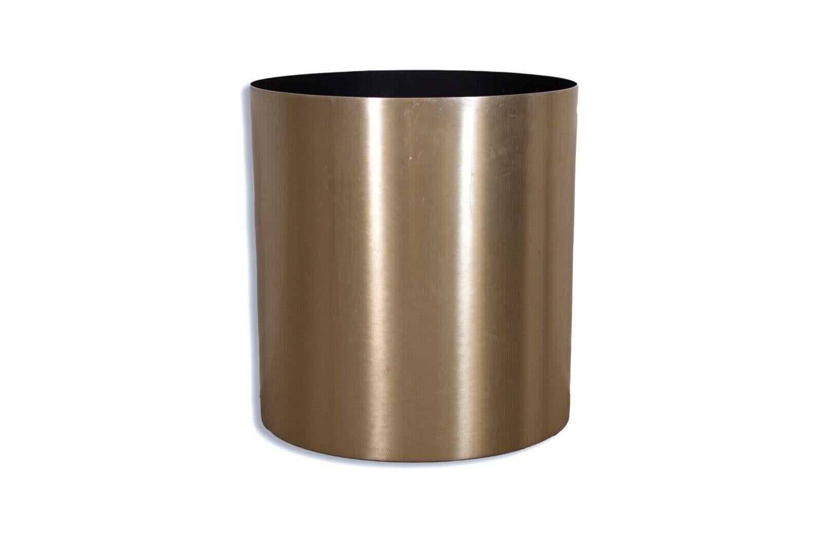 The brushed steel cylinder planter is a sleek and sophisticated choice for adding a touch of modern elegance to any indoor or outdoor space. Crafted with precision, this planter showcases a cylindrical shape with clean lines and a brushed steel