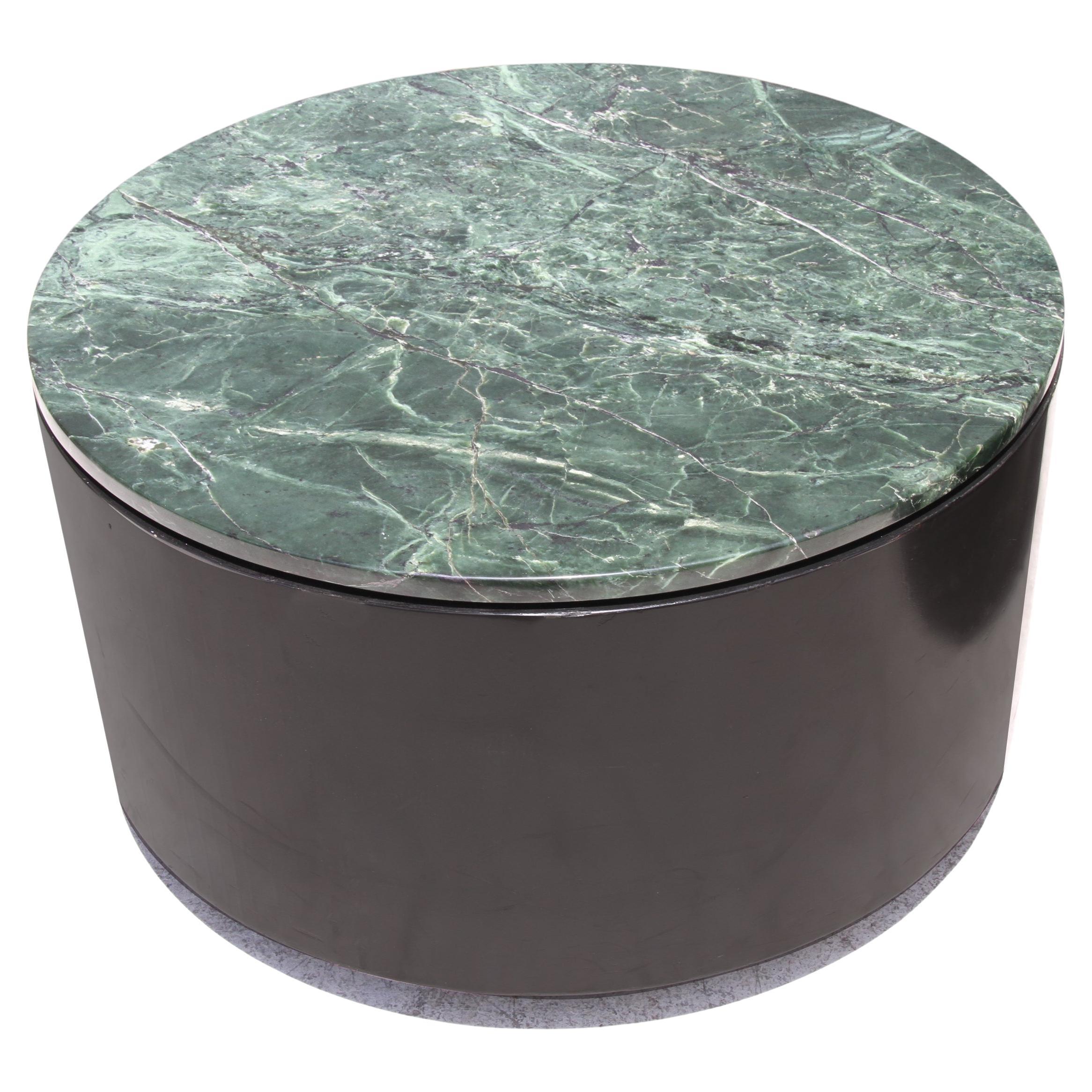 Mid-Century Modern Paul Mayen Style Green Marble Top Drum Side Table

Stunning vintage Paul Mayen style marble top cylinder drum side or end tables.
Richly marbeled with black and green veining.
2 Available.
Dimensions: 36
