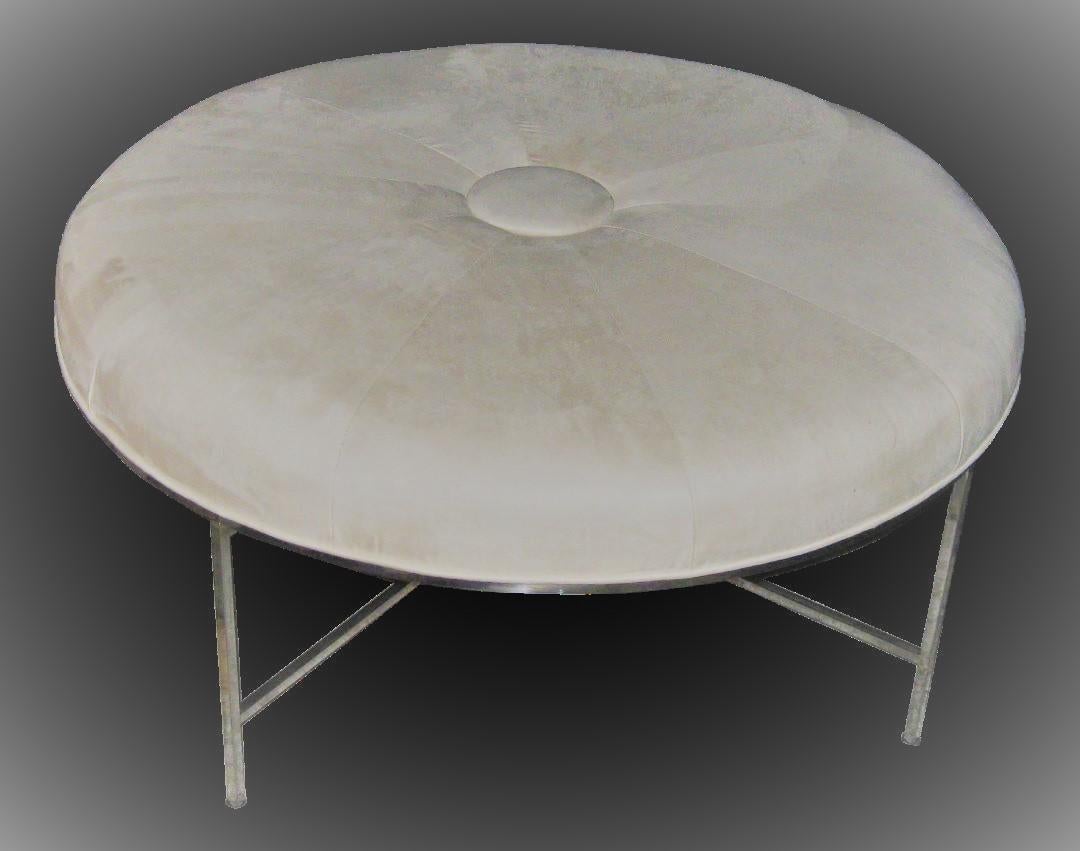 Mid-Century Modern 1960s Paul Mccobb large round lounge with chrome x base.
This piece is also described as a large Paul McCobb round upholstered bench as well as a large round stool.

1960s Paul McCobb Large circular lounge chair with chrome x