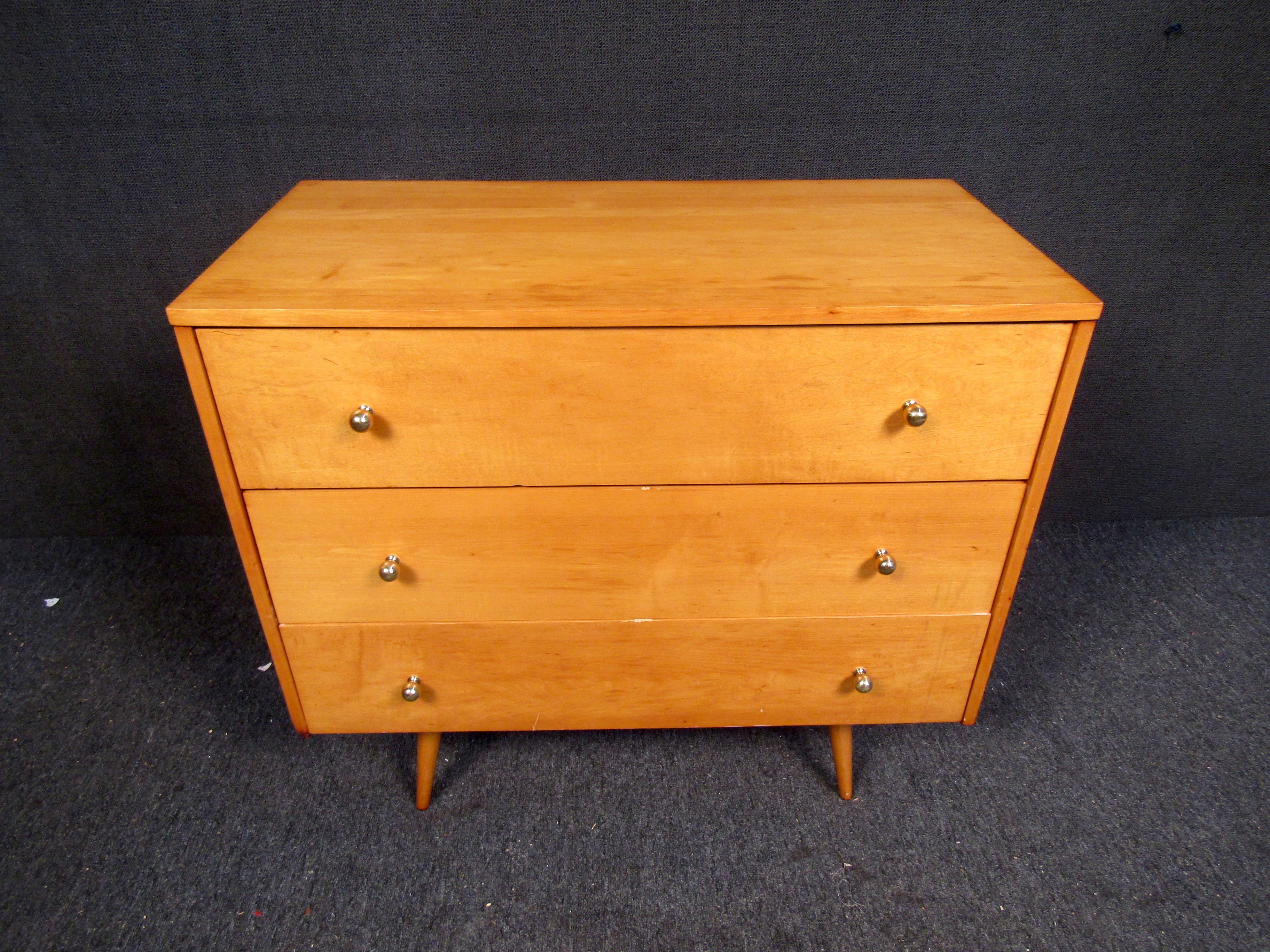 Handsome, classic Mid-Century Modern three drawer dresser, chest by Paul McCobb for his Pre-Planner Group Winchendon modern line made by Winchendon Furniture in the 1950s. Features three spacious, deep drawers, all resting on beautiful tapered feet.