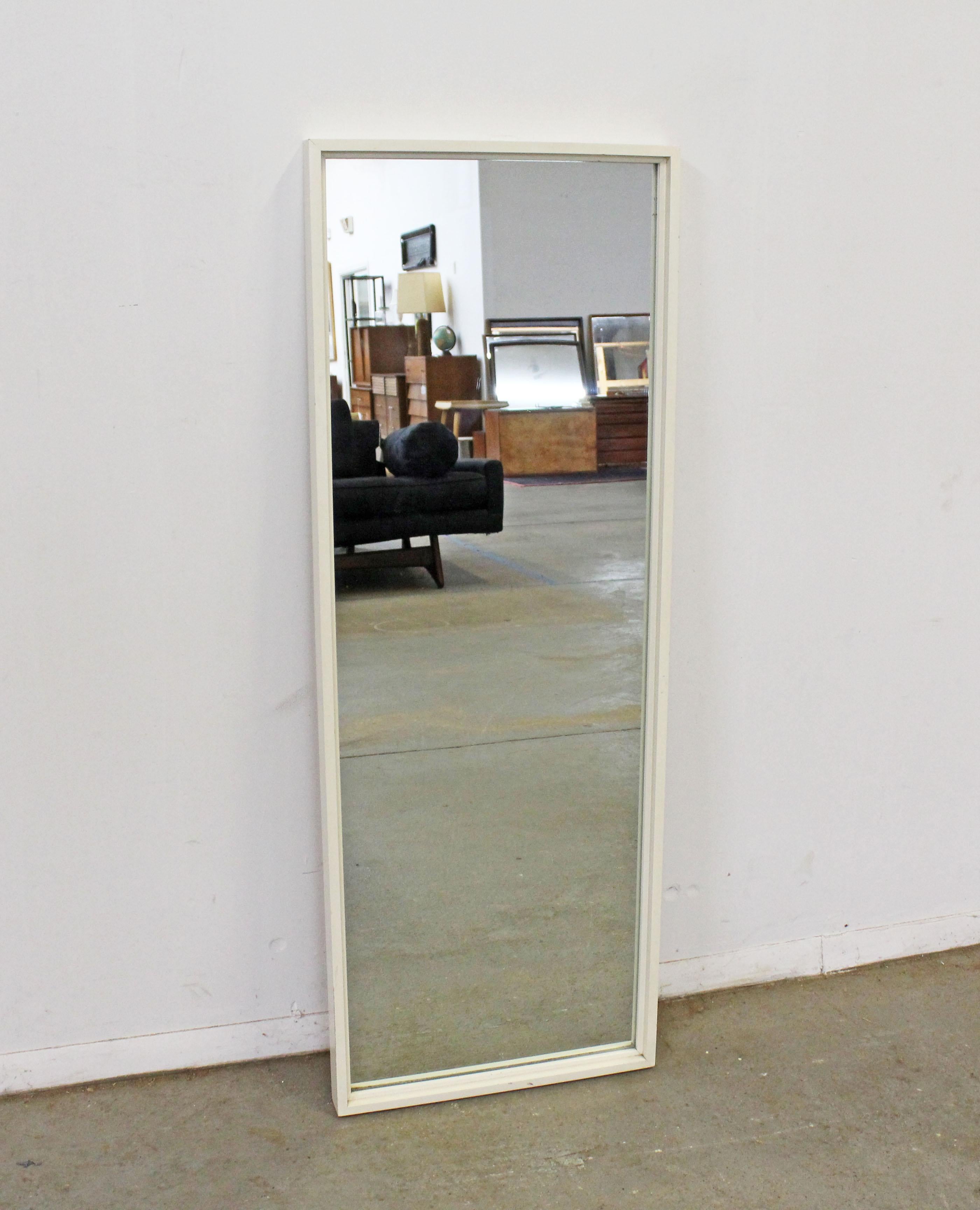 Offered is a vintage Mid-Century Modern mirror by Paul McCobb for Planner Group. This piece came with a matching and signed bedroom set. Has a hanger on the back. It was painted by the previous owner, but still in good condition with a few scratches