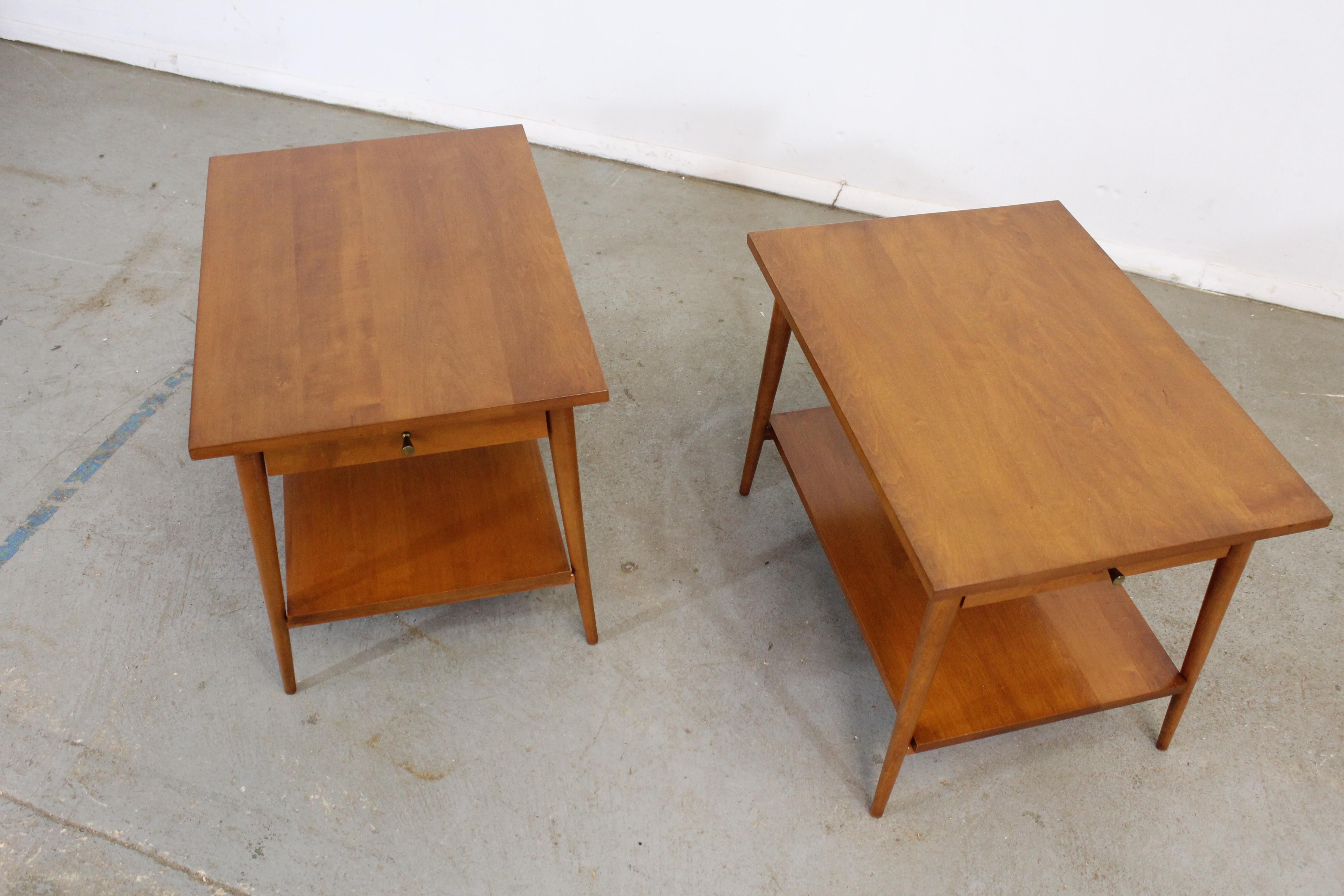 Mid-Century Modern Paul Mccobb nightstands/end tables
Offered is a pair of mid-century nightstands with sleek lines designed by American designer Paul Mccobb. Made from yellow birch, these stands feature beautifully sculpted legs and two drawers
