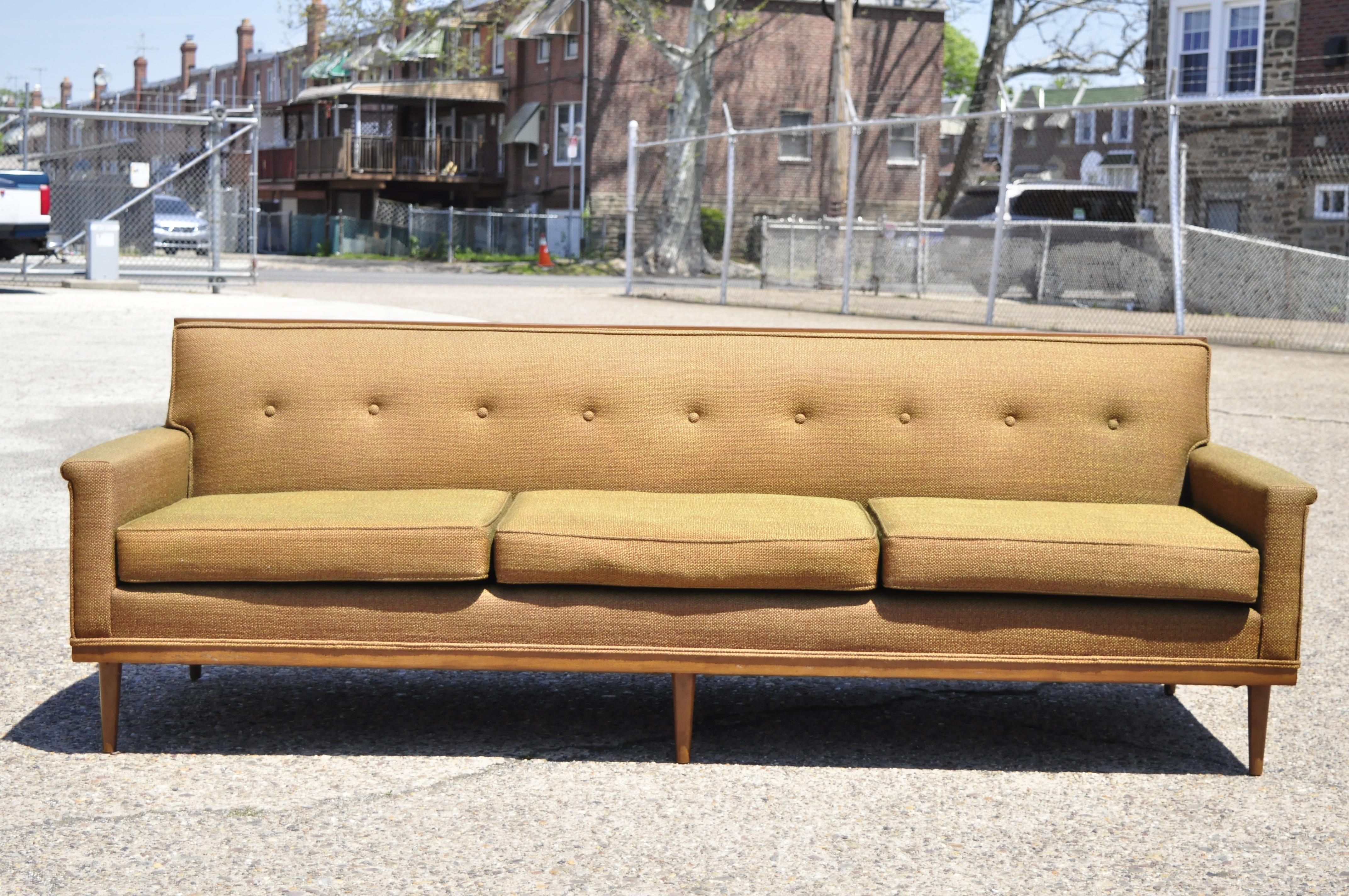 Mid-Century Modern Paul McCobb style wood frame sofa couch by J.B. Van Sciver. Item features solid wood trimmed frame, flared arms, solid wood frame, original label, tapered legs, clean modernist lines, sleek sculptural form, circa mid-20th century.