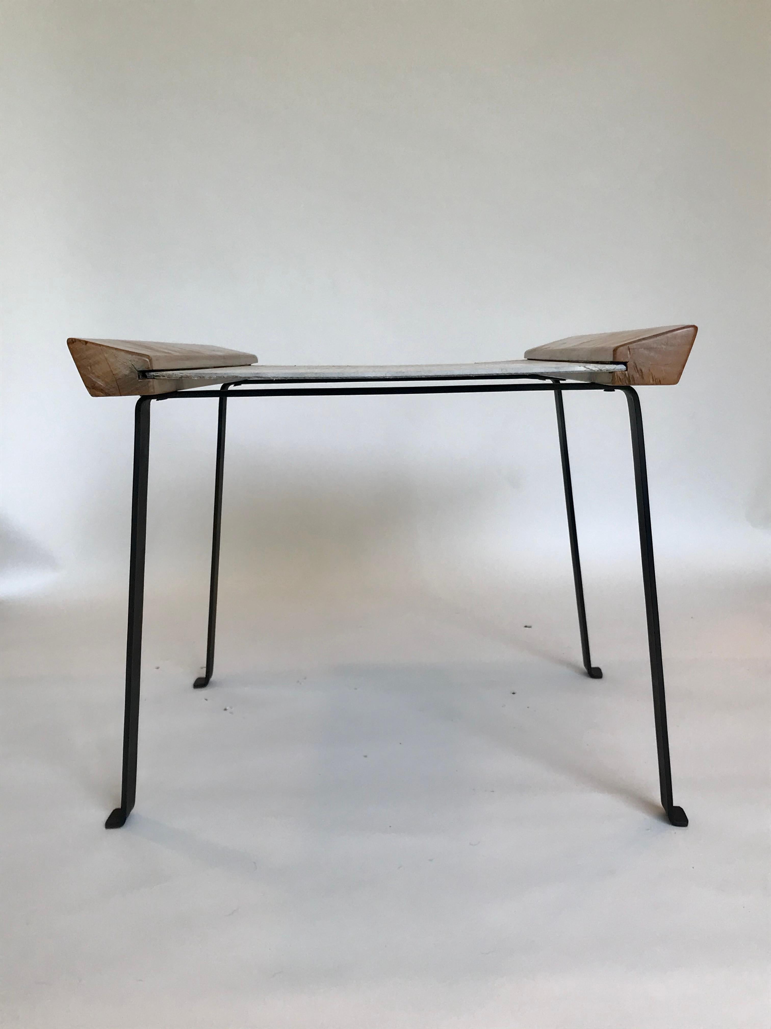 Rare table
Simple handmade pieces 
Iron, birch wood and pegboard
Nice form + function for any occasion and or collections 
Original condition showing normal wear
Small crack on one end of the top, patina on the wood, iron base is solid and