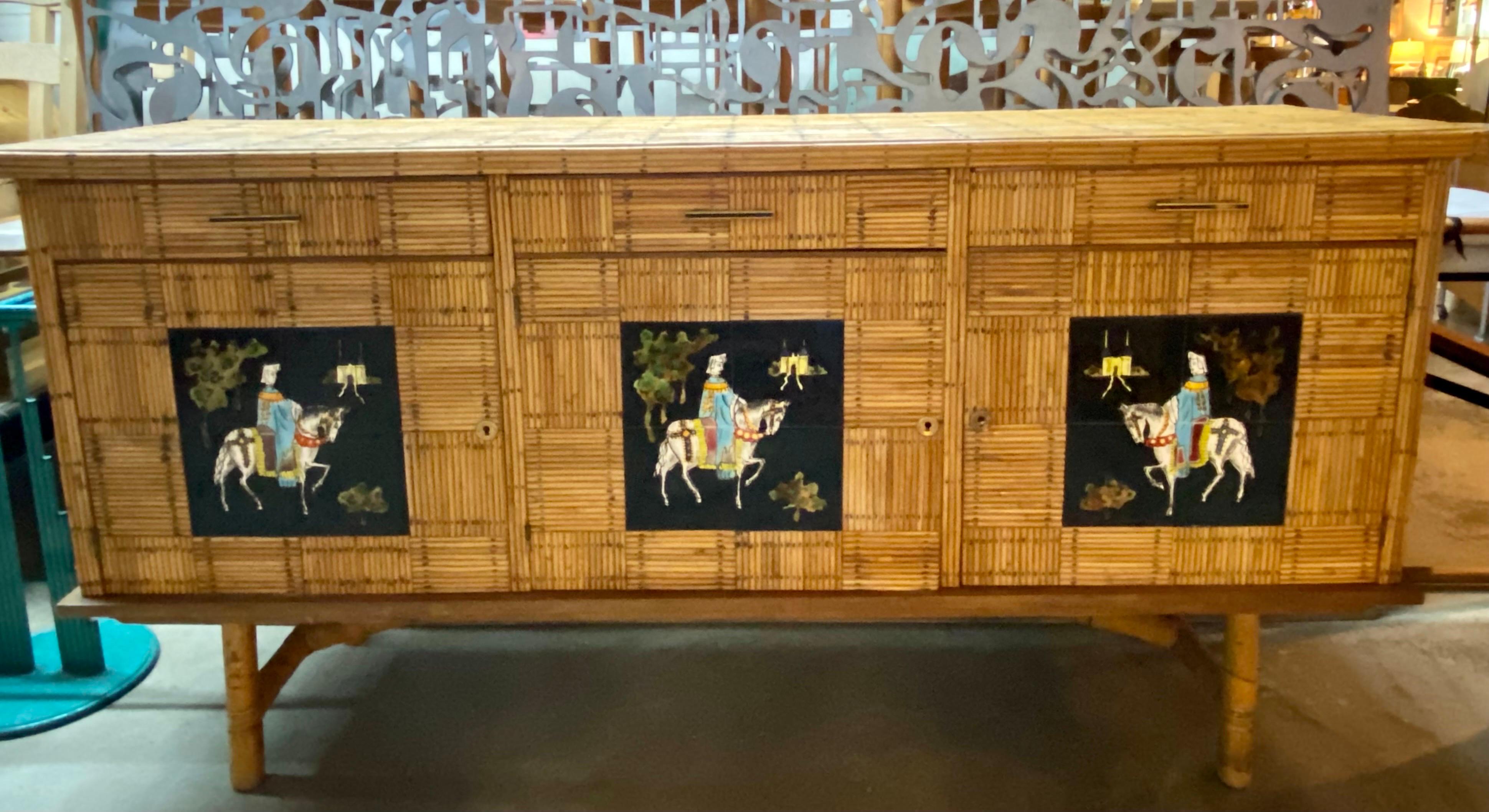 Mid-century modern pencil reed credenza by Adrien Audoux and Frida Minet, France, circa 1960s. This sideboard is in good condition, unfinished on the back. 
Dimensions: 75.5