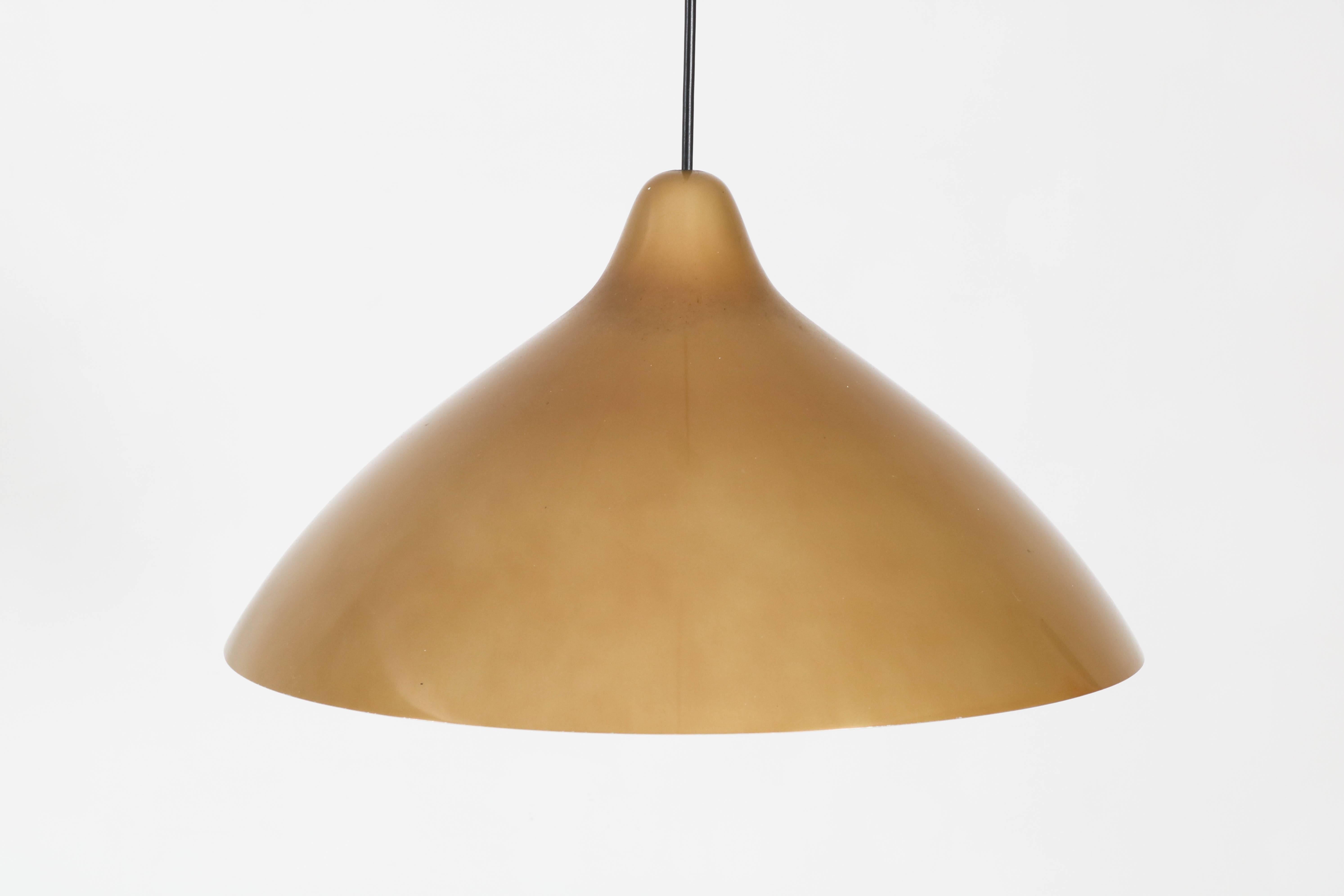Elegant Mid-Century Modern pendant by Lisa Johansson-Pape for Stockmann Orno, 1960s.
Aluminum shade with original color.
Rests of sticker label on the inside of the shade.
In good original condition with minor wear consistent with age and