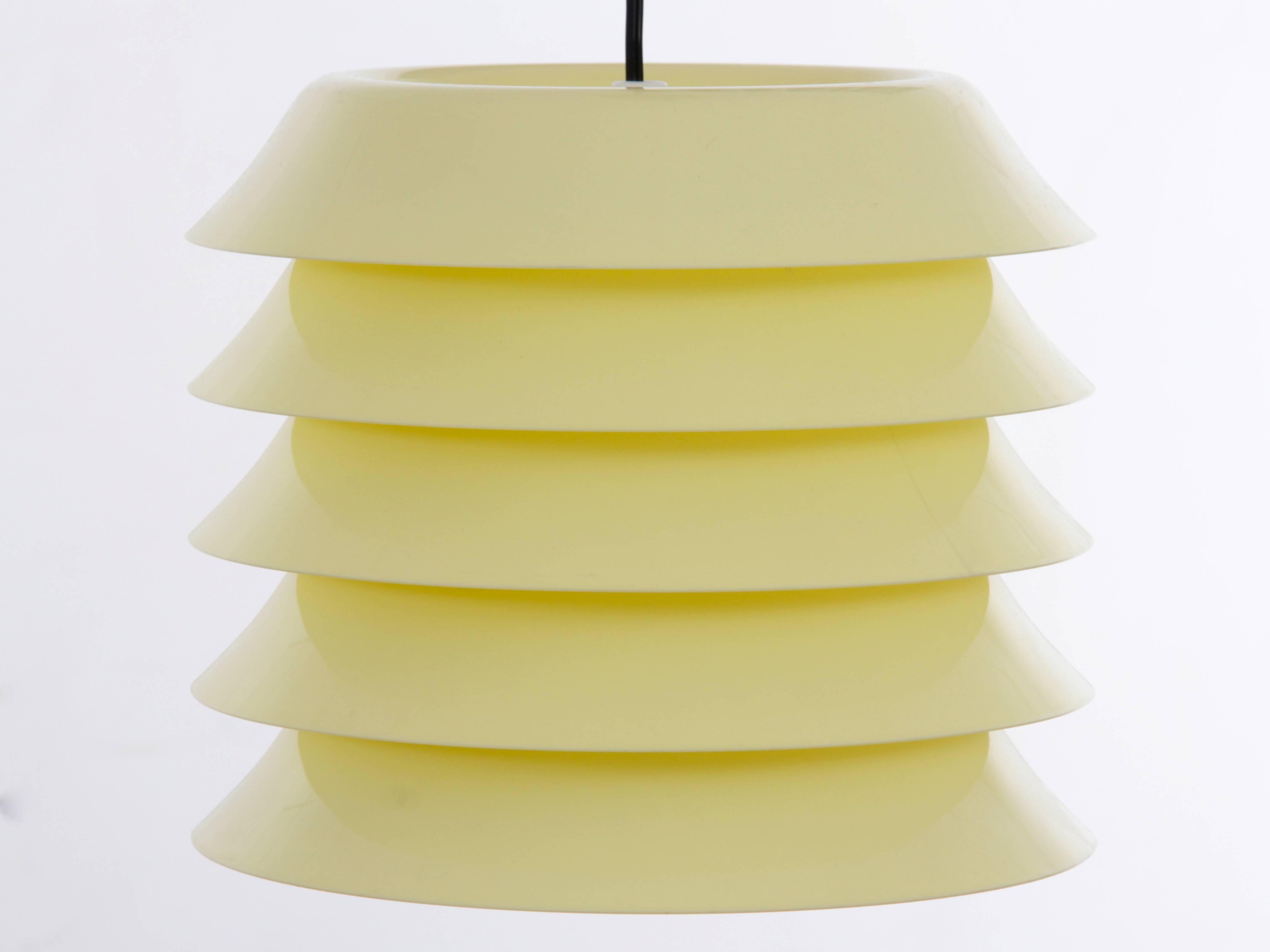 Mid-Century Modern pendant lamp. Pale yellow. New electrical system brought up to EU standard. E27 bulb.
