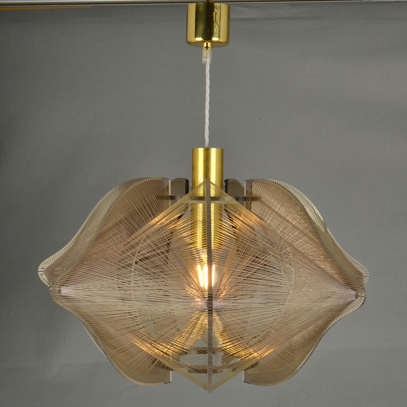 Sculptural lamp made of mauve acrylic / Perspex and clear transparent wire accompanied brass internal fittings holder. The design is influenced by the pioneer, Avant Garde artist and sculptor Naum Gabo (1890–1977). 
These lamps are monumental as a