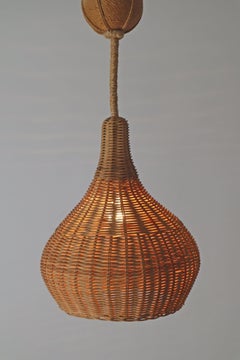 Mid-Century Modern pendant lamp in the shape of an onion, made of rattan