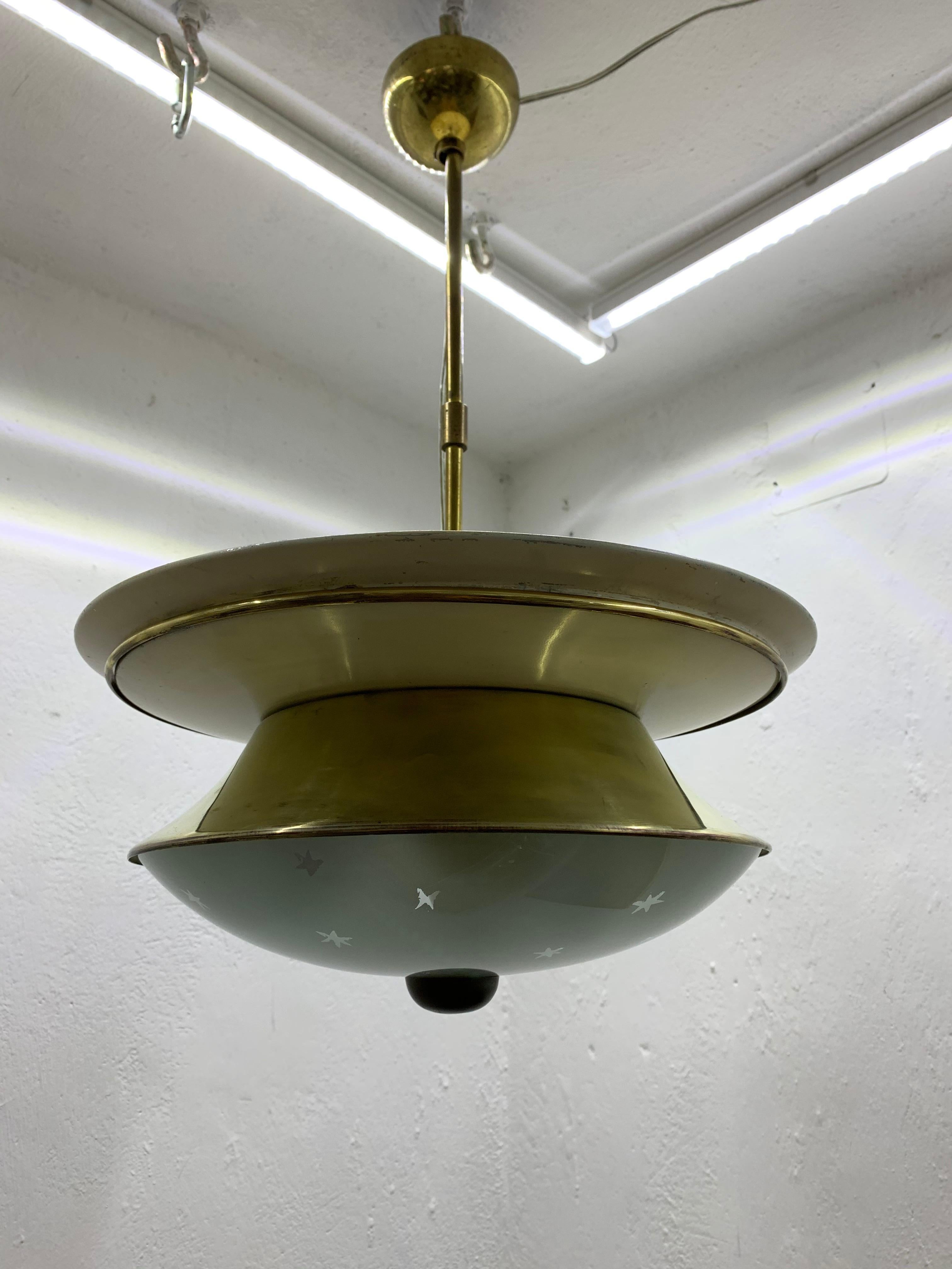 Mid-Century Modern 3 light chandelier attributed to Pietro Chiesa for Fontana Arte, 1950s.
Materials:
Brass,
Lacquered metal
Glass

The height of this chandelier can easily be adjusted to longer with a brass rod or also converted into a flush