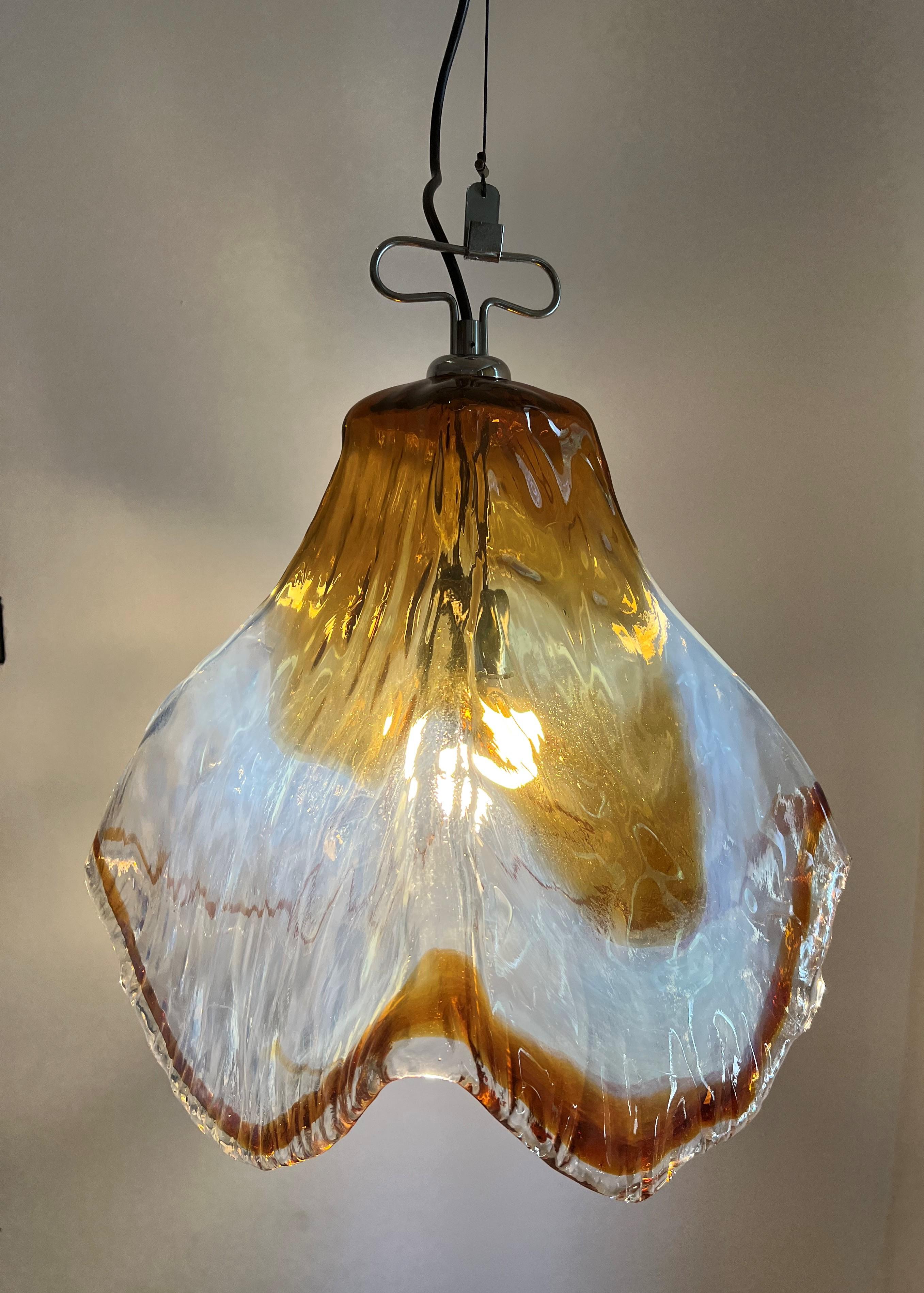 Large Mid-Century Modern bell-shaped pendant light manufactured by the Mazzega Factory under Carlo Nason's direction and designs. 
The drop of the chandelier can be adjusted, it is currently aproximately 3.5 ft long.
The bell alone measures, 41 cm