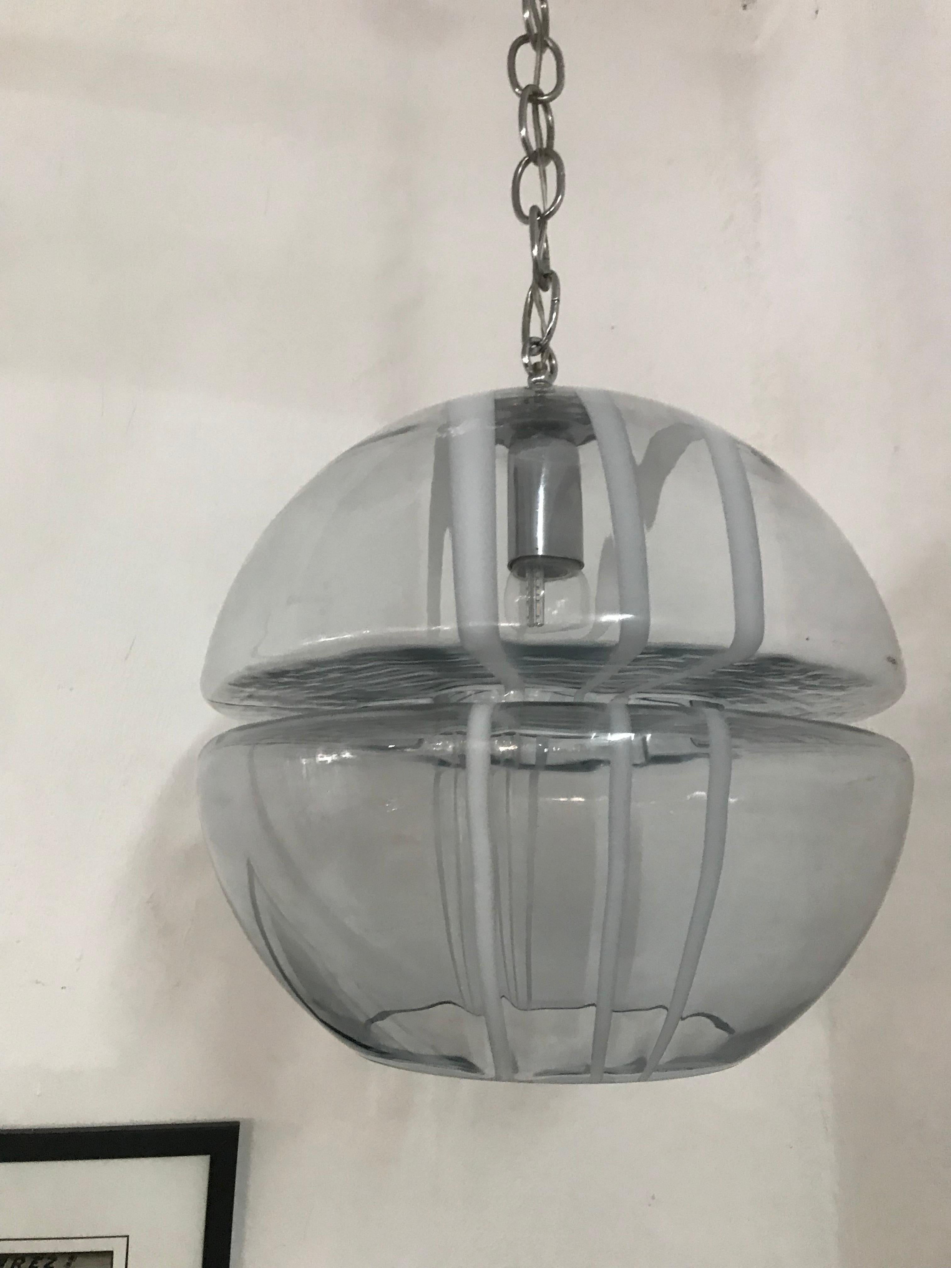 Space Age chandelier in the shape of a sphere, manufactured in clear-blue and white coloured Murano glass. Its design is attributed to Toni Zuccheri and Venini, Italy, circa 1960s.