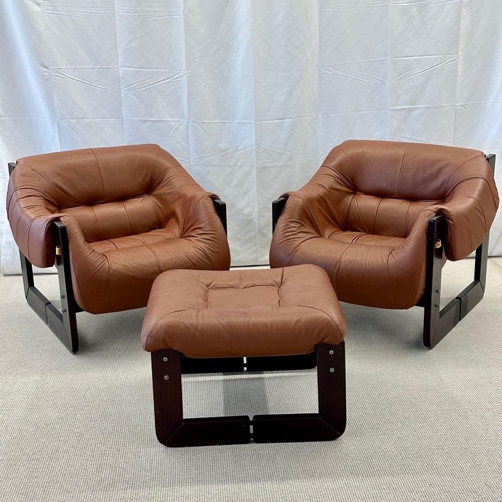 Mid-Century Modern Percival Lafer Lounge Chairs in Brazilian Rosewood, Labeled

Very rare pair of distressed leather and Brazillian rosewood arm/lounge chairs by Percival Lafer. Model MP-97, designed and produced in Brazil, 1960s.

Impeccably