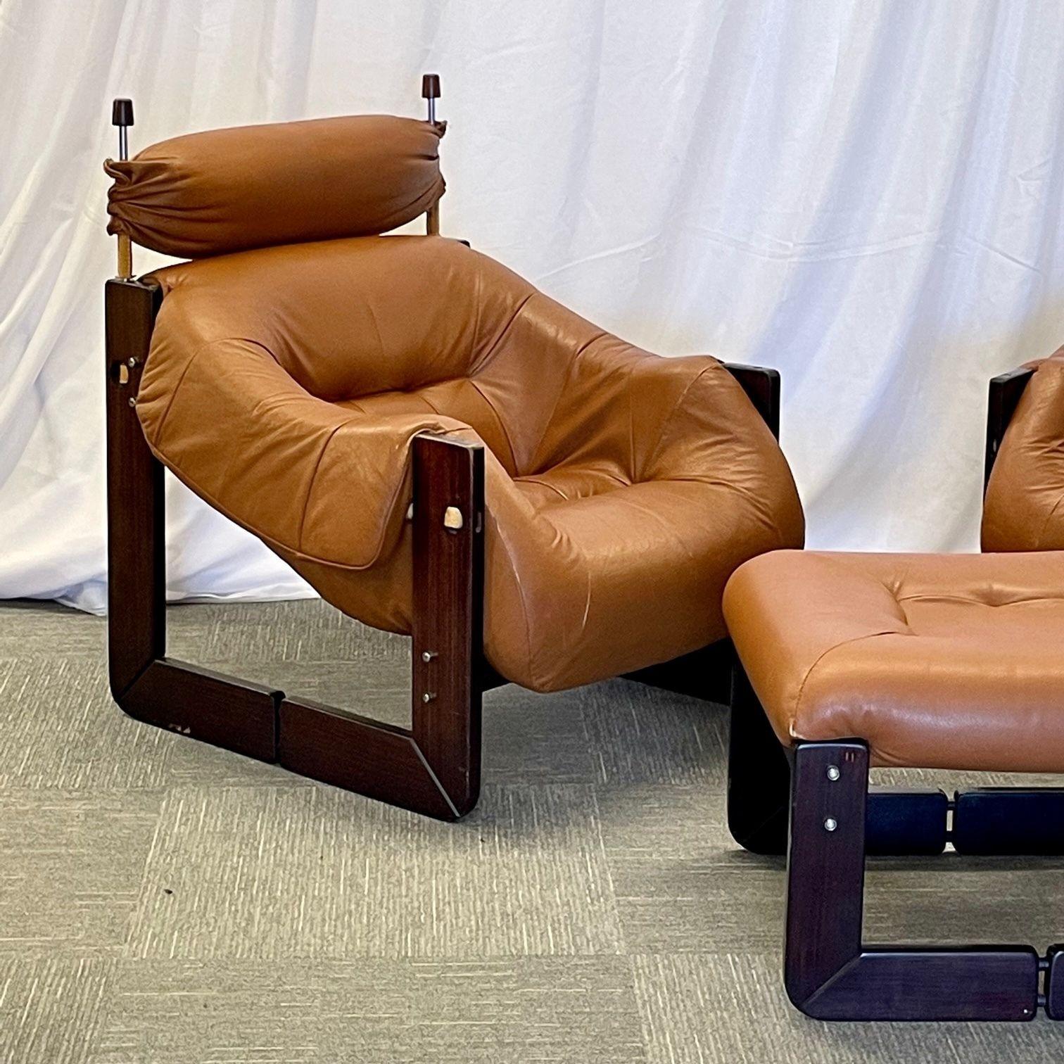 Mid-Century Modern Percival Lafer lounge chairs, Ottoman, Brazilian Rosewood
 
Very rare distressed leather and Brazillian rosewood arm/lounge chairs by Percival Lafer. Model MP-97, designed and produced in Brazil, 1960s.
 
Impeccably crafted,