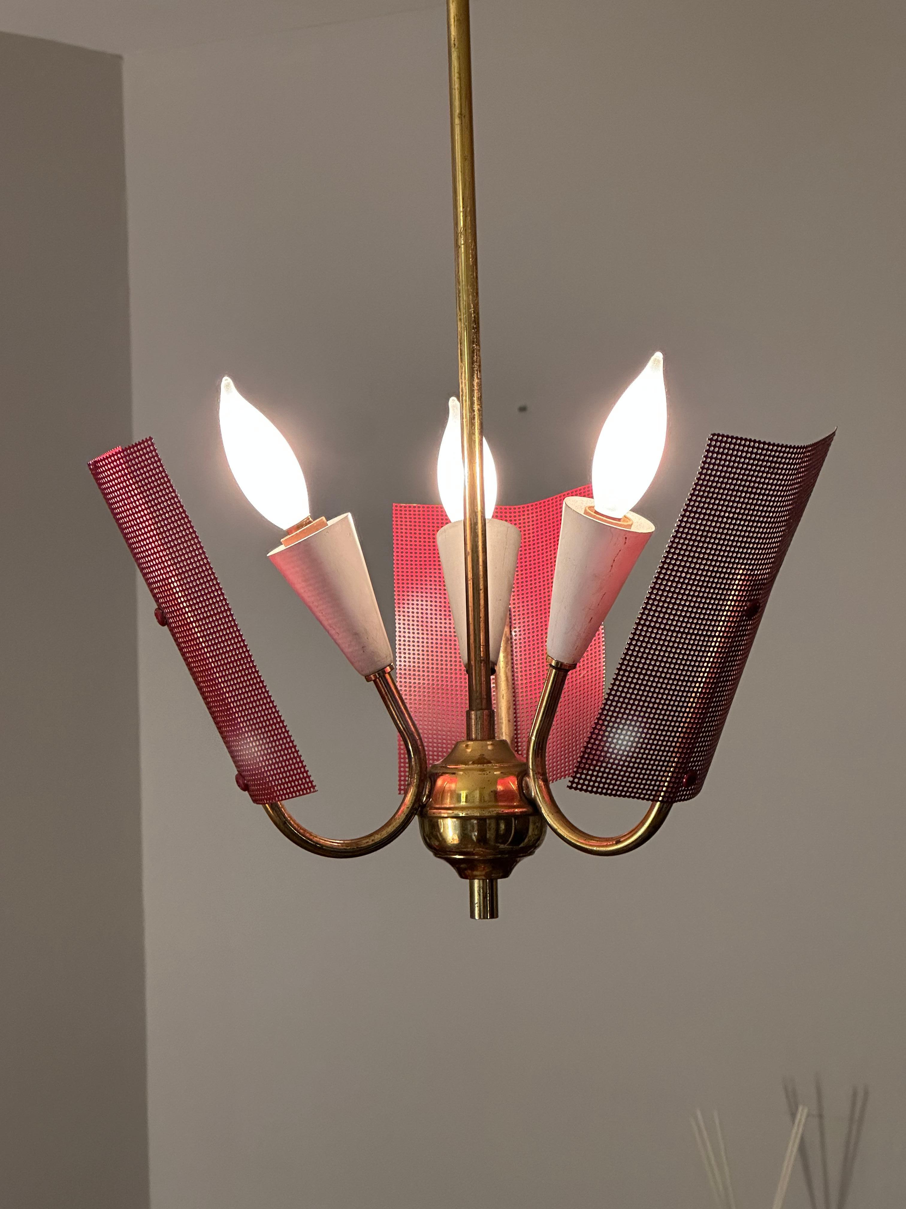 Italian Mid Century Modern Perforated Red Metal and Brass Chandelier For Sale