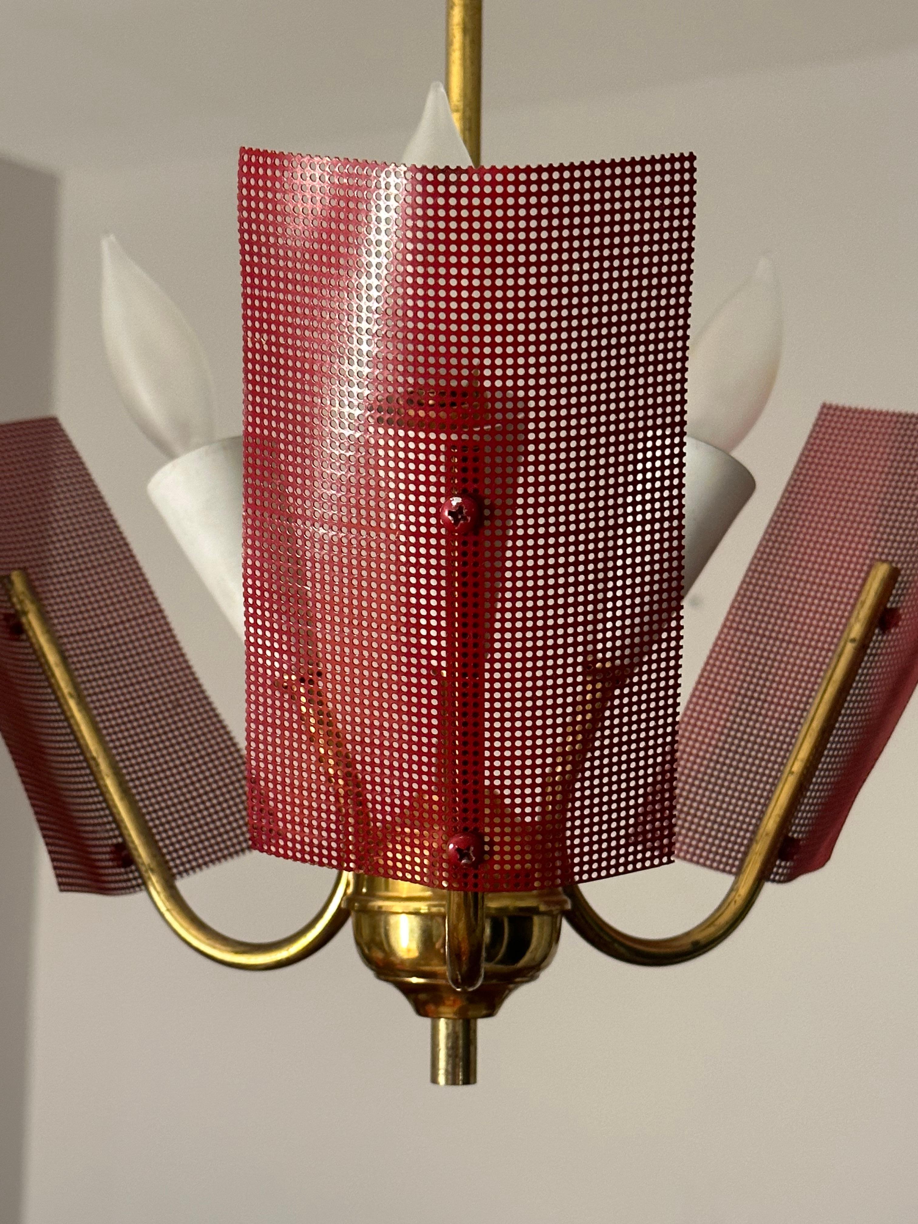 Mid Century Modern Perforated Red Metal and Brass Chandelier In Good Condition For Sale In St.Petersburg, FL