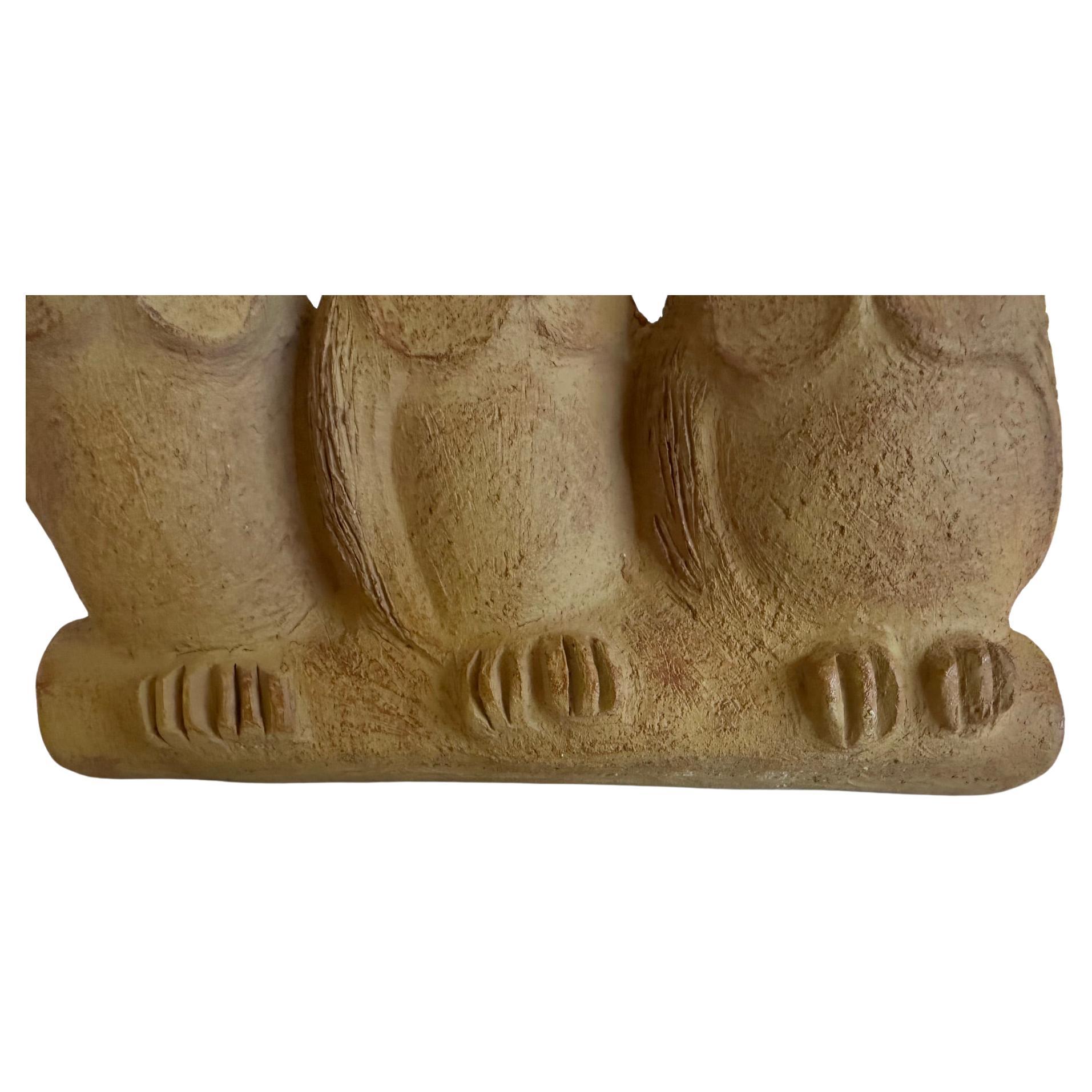 Stylized midcentury modern stoneware sculpture of 3 owls.

Note:  There's a single owl that complements this trio also listed.